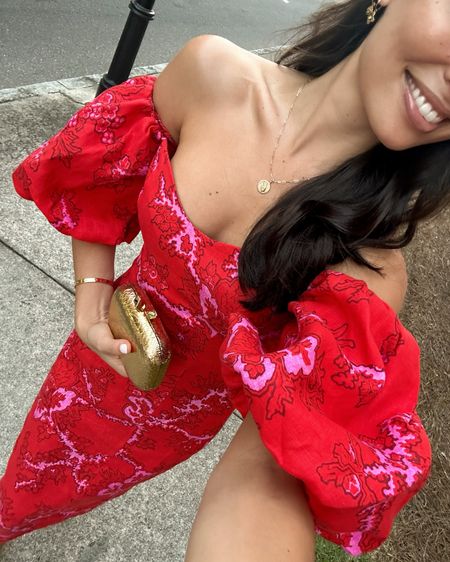 Kat Jamieson wears a red floral off the shoulder linen dress to a wedding rehearsal. Event, party, gold clutch, formalwear, wedding guest dress. 

#LTKwedding #LTKSeasonal #LTKHoliday