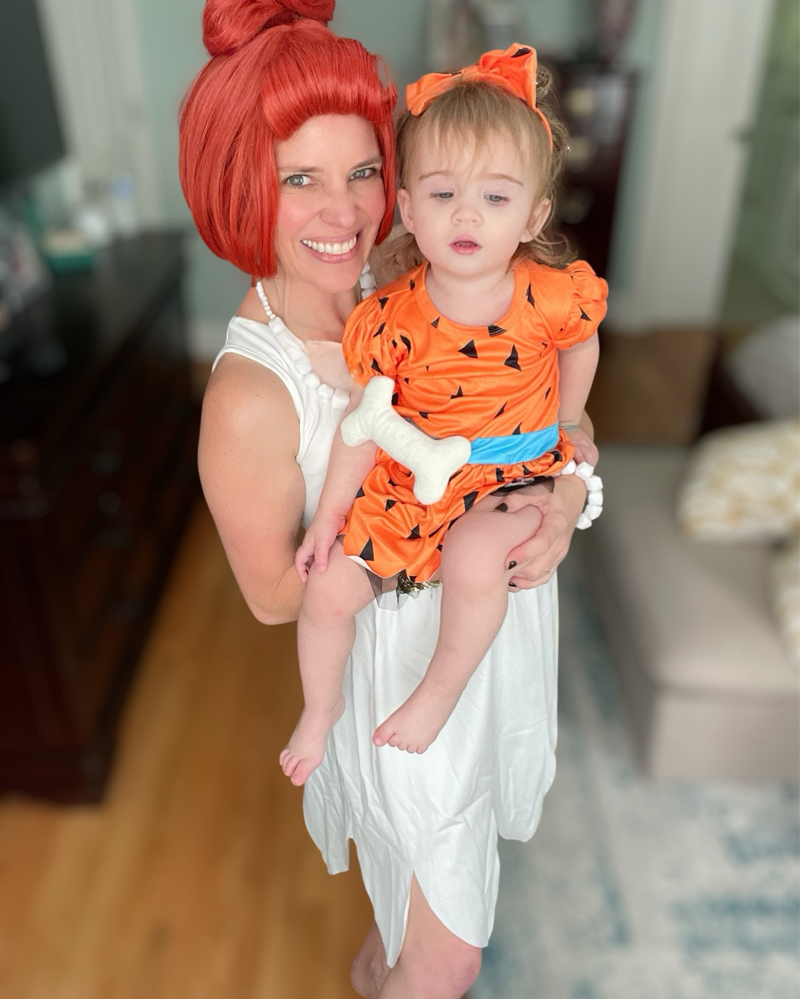 Yabba Dabba Doo! 🦴💕 This year’s Mommy & Me Halloween costumes are straight out of Bedrock! I dressed up as Wilma Flintstone while Caroline is the cutest little Pebbles Flintstone. These easy & affordable Amazon finds made it so simple to put together a themed family costume that’s instantly recognizable and perfect for trick-or-treating, parties, or school events.

The Wilma costume set includes the dress, necklace, and red wig for a complete look 👩🏻‍🦰, while Caroline’s Pebbles toddler dress comes with the orange spotted top + bone hair accessory 🦴 for that classic Flintstones style. If you’re doing a full family costume, there’s also a matching Fred Flintstone option for dad.

👩‍👧 Mommy & Me costumes are such a fun way to make memories and stand out on Halloween—plus, these are super comfortable for all-day wear.

⸻

mommy and me Halloween costumes 🎃 | Wilma Flintstone costume | Pebbles Flintstone toddler outfit | family Halloween costumes | Flintstones costumes | cartoon-inspired costumes | Amazon Halloween costumes | affordable Halloween costume ideas | mommy daughter costumes | trick or treat outfits


#LTKBaby #LTKHalloween #LTKFamily

#LTKHalloween #LTKKids #LTKFamily