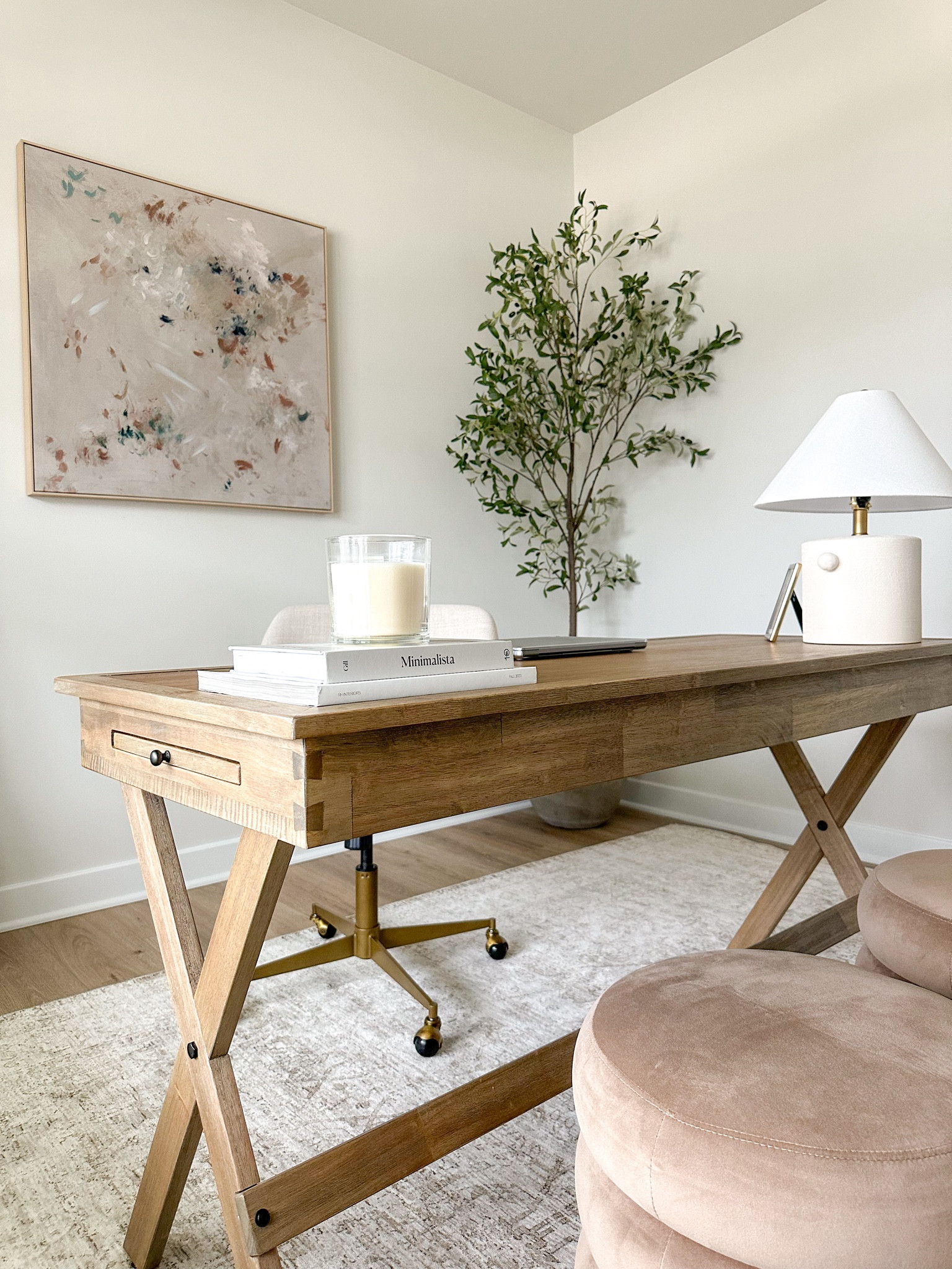 Home office views 
#homeoffice #worldmarket #officedesk #officechair #wallart #ottomans #olivetree #concreteplanter 

#LTKhome #LTKstyletip #LTKfindsunder100