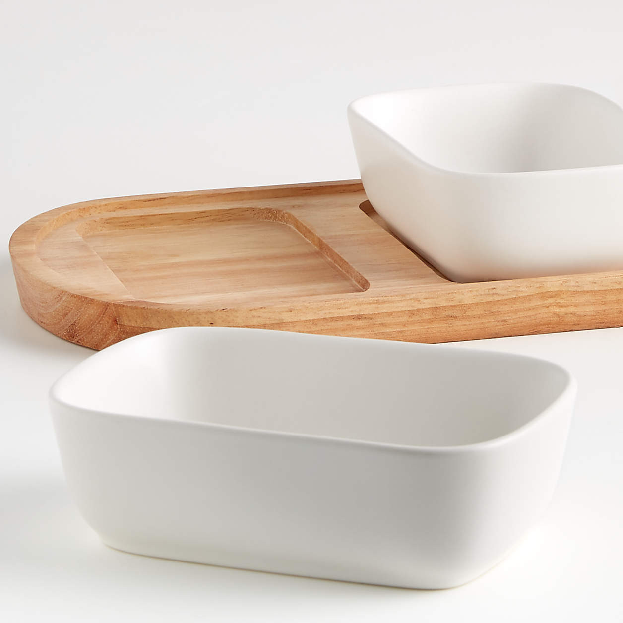 Oven-to-Table Oval Serving Bowls with Oval Wood Trivet + Reviews | Crate & Barrel | Crate & Barrel