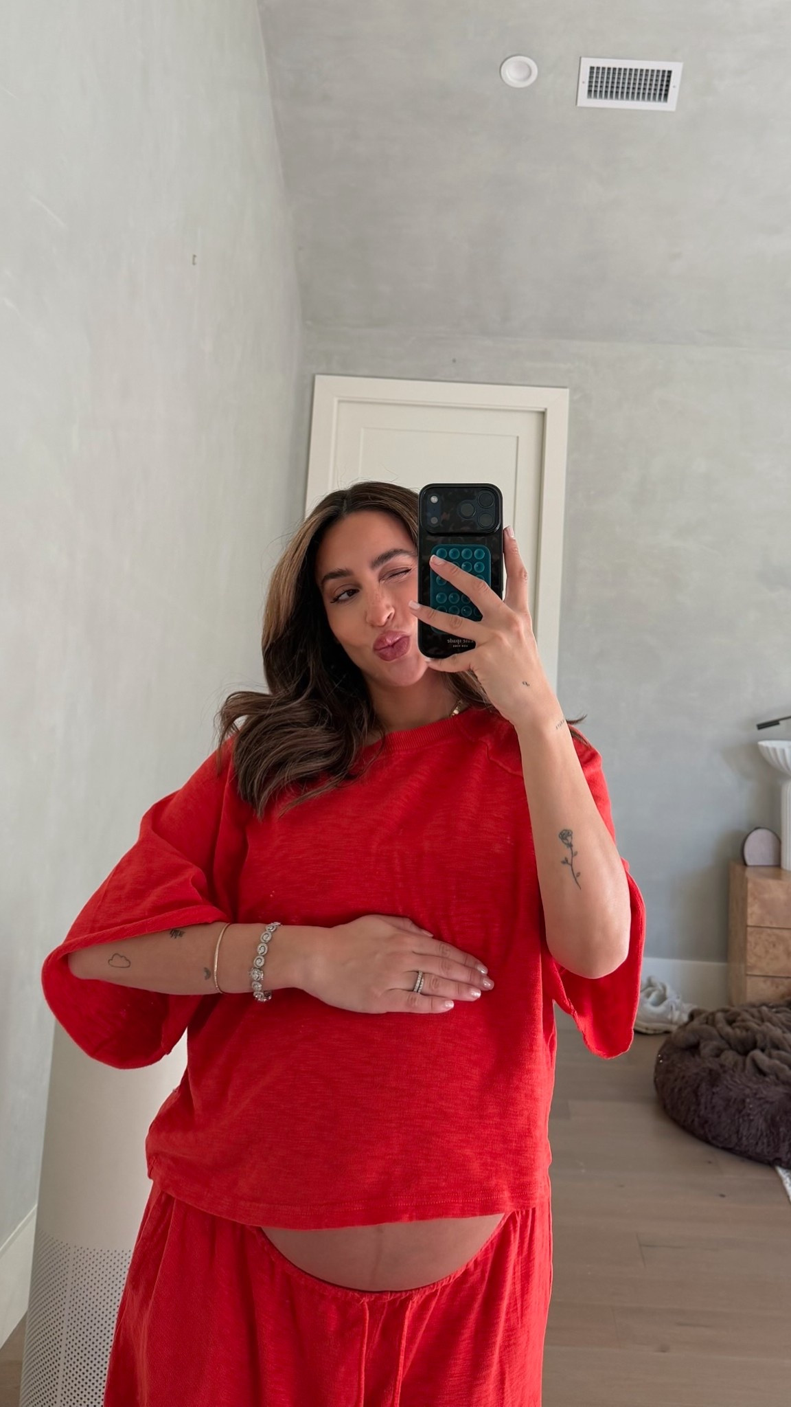 Pregnancy uniform wearing a medium! 