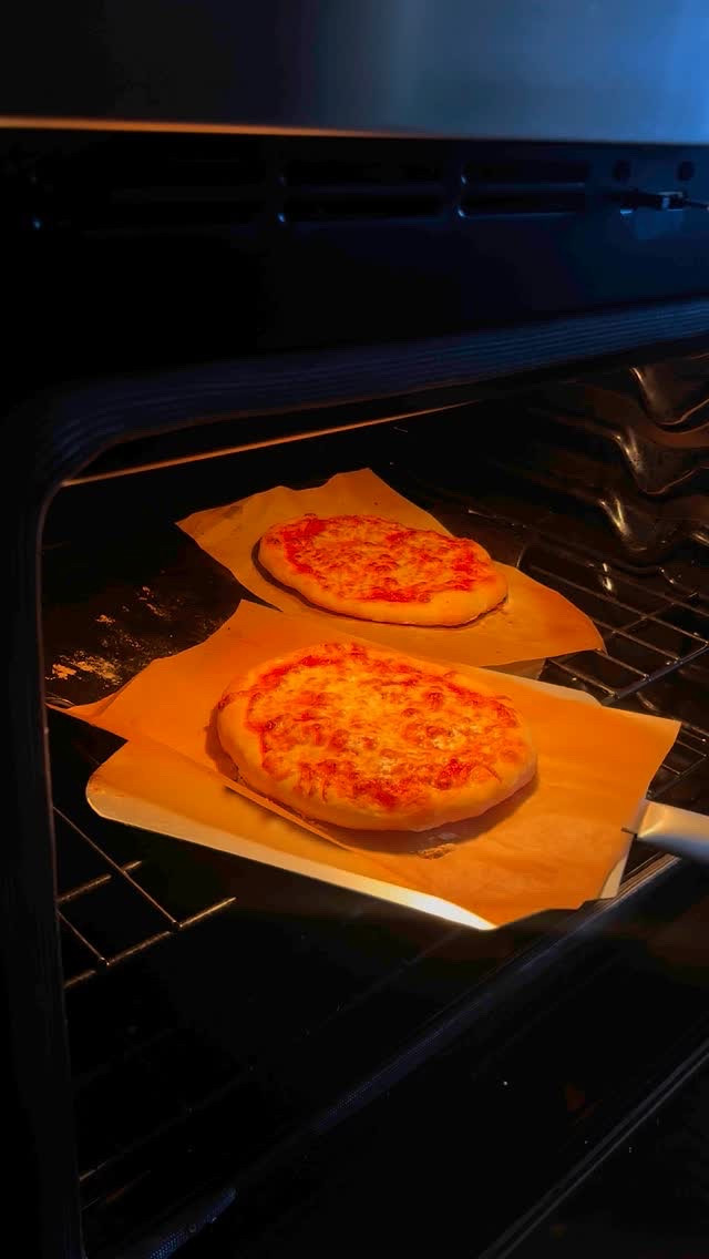 Nothing beats homemade Neapolitan-style pizza dough. It’s fluffy, chewy and has a perfectly crispy crust. Everything what you want in a pizza.

Allow 2 hours for this dough to rest and rise before baking.

What you’ll need:
1 cup warm water
1 teaspoon active dry yeast
1 teaspoon honey
2 1/4 cups ‘00’ flour, or bread flour
1 teaspoon kosher salt
Extra virgin olive oil

How to make it:
Add warm water, active yeast and honey. Stir to dissolve.

Pour in the yeast mixture into 00 flourand mix on low speed for about 5-8 minutes. The dough will start to pull away from the sides but still remain soft and slightly sticky at the bottom of the bowl.

Cover with a towel and allow to sit in a warm place for 1 hour or until doubled in size.

Knock down the dough. Choose to cut into 4 equal pieces if making small pizzas, or simply reform into one big ball. Allow the dough to proof for an additional 1 hour on a greased baking sheet. Spray the tops with oil and cover with plastic wrap or a towel. 

The dough is now ready to use. Preheat the oven to 500° F, and place a baking sheet or pizza stone in the oven to preheat.

Lay on unbleached parchment paper and gently push/pat the edges out, turning the dough to stretch to an 8-11” rough circle. Add your favorite toppings. Transfer the dough-on-parchment to the hot baking sheet or pizza stone.

Bake at 500° F for about 5-6 minutes, or until golden brown. Drizzle the crust with extra olive oil if desired. Slice and serve hot.

More recipes like this at hollandhouseeatery.com
@hollandhouse.eatery 

#Homemadepizza #foodblogger #easyrecipes

#LTKFamily #LTKParties #LTKHome