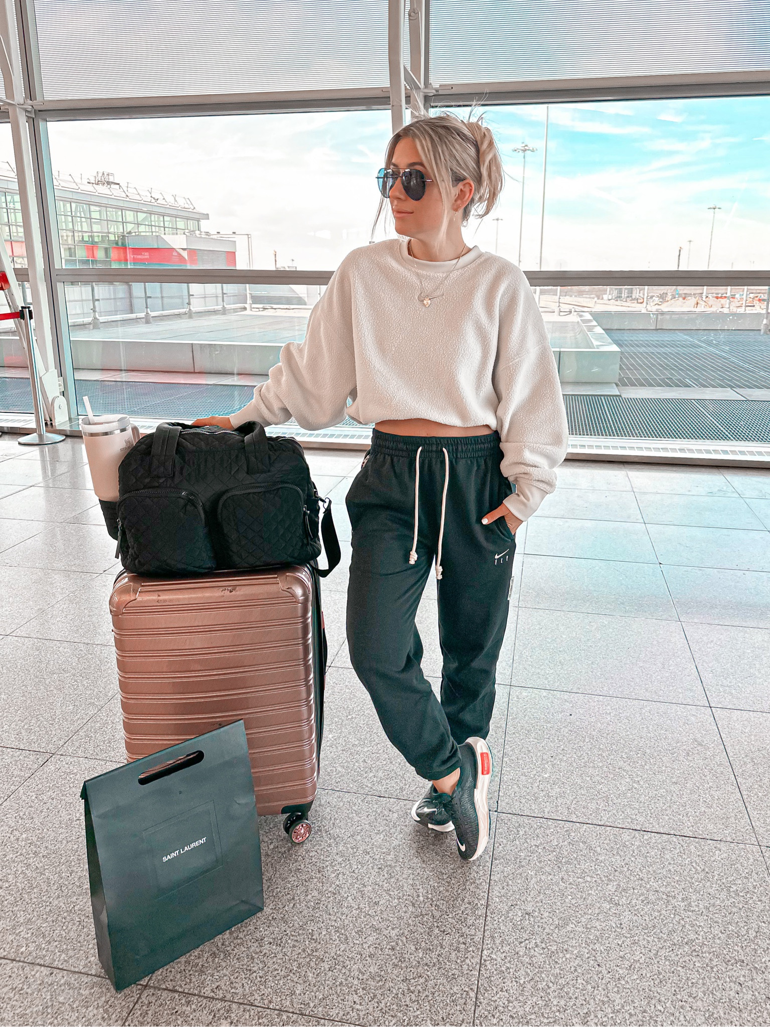 Comfy travel outfit  sweatshirt: Nike size xs sweatpants: Nike size xs Bags: Walmart luggage & weekender  Shoes: Nike size 6.5 Sunglasses: Diff eyewear  
#revolve #nike #comfy #travel #laurabeverlin

#LTKtravel #LTKunder50 #LTKsalealert