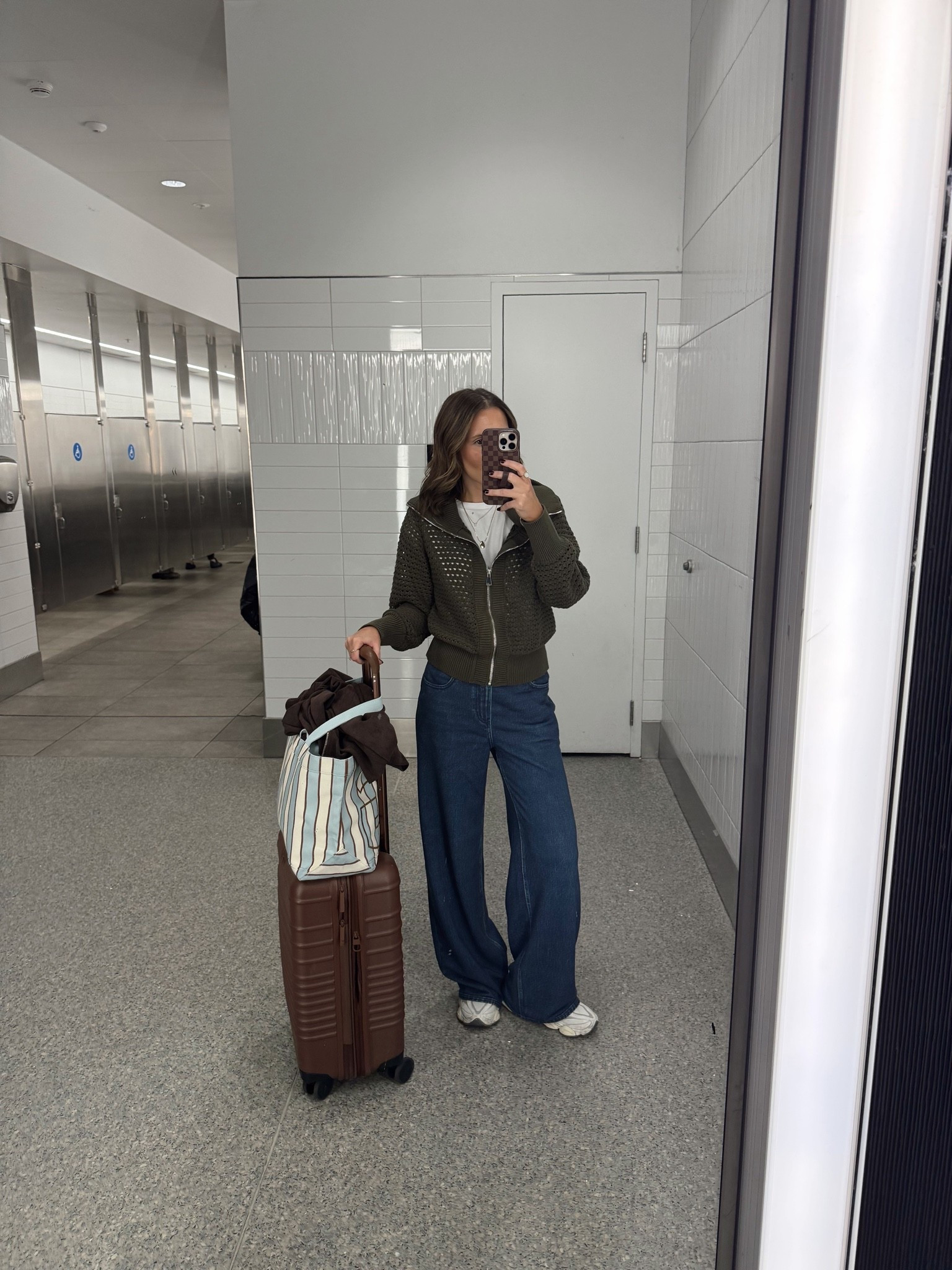 Travel ootd🤎 you might think I’m crazy for wearing denim, but you guys, these are SWEATS! They look just like denim and even have functional pockets. They are so comfy! Paired with a tee and the cutest zip cardigan

#LTKootd #LTKTravel