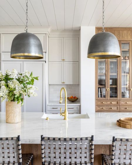 The prettiest pewter and brass pendants. So beautiful in a kitchen like this or would be pretty hanging above a vanity in a boy’s bath or above a laundry utility sink.


#LTKhome #LTKstyletip #LTKfamily
