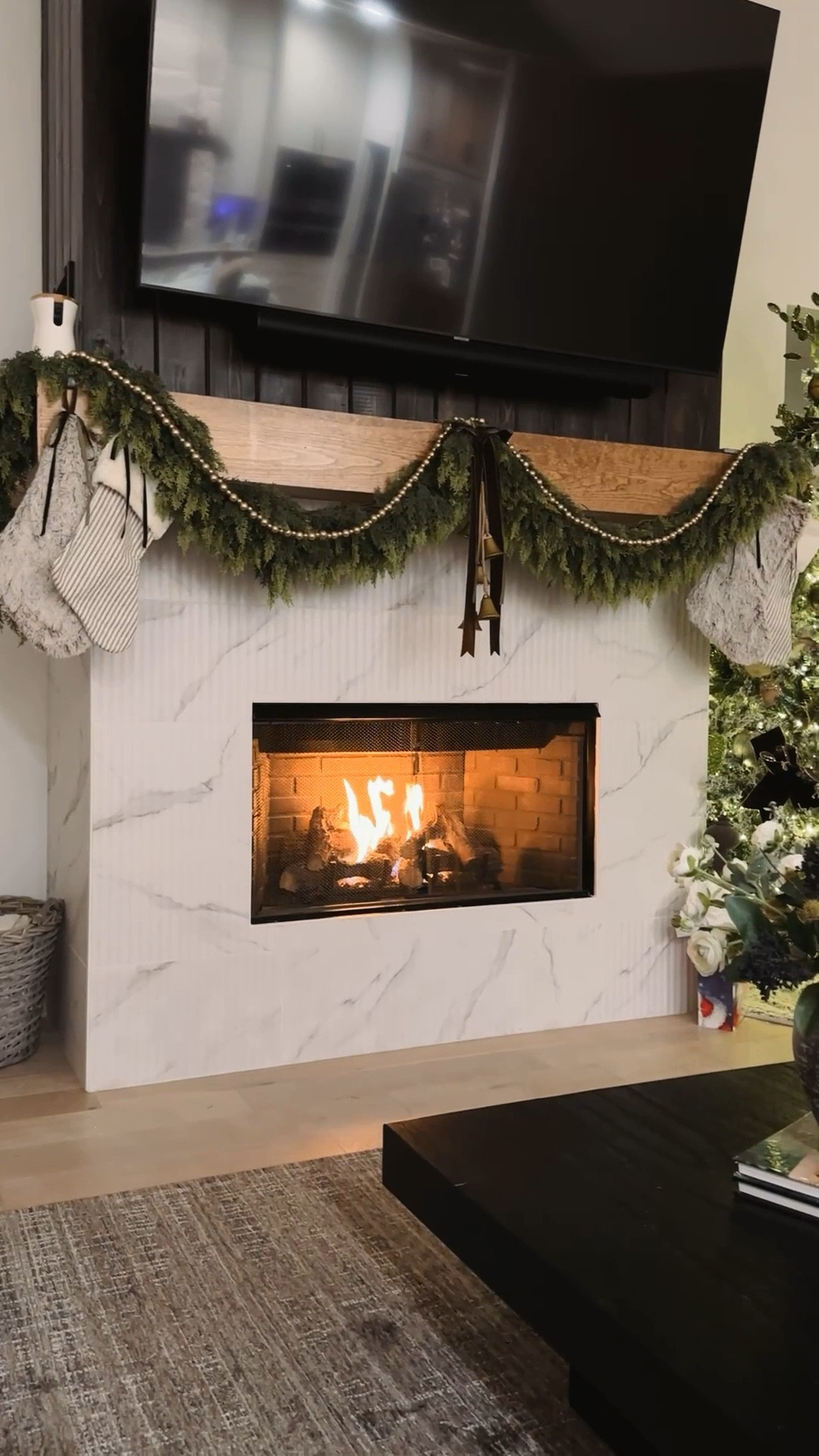 The coziest time of year! 🥰🎅🏻🎄 I always get so sad to take down our Christmas mantle decor at the end of the holidays!

Stockings and vase with flowers on the coffee table are from hobby lobby.

Holiday decor | Christmas decor | mantle decor | garland | stockings | tree

#LTKSeasonal #LTKHome #LTKHoliday