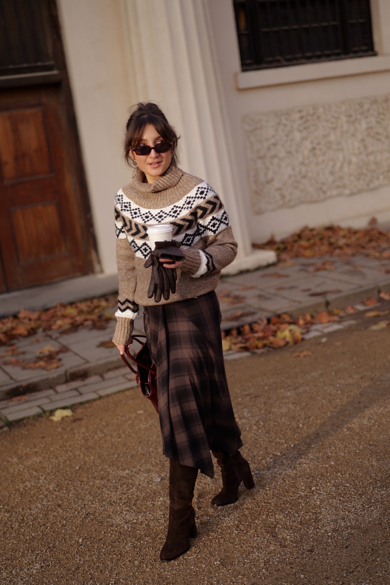 The perfect cosy outfit for a day in the city. Check skirt and fairisle knit, knee high boots from the high street, luxury bag 🤎

#LTKstyletip #LTKeurope #LTKuk