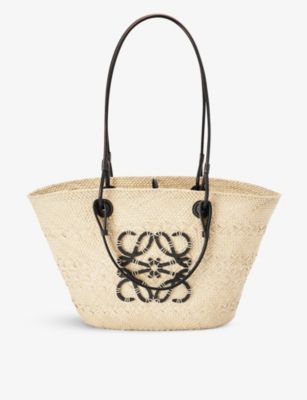 Loewe Paula’s Ibiza Anagram palm-woven and leather tote bag | Selfridges