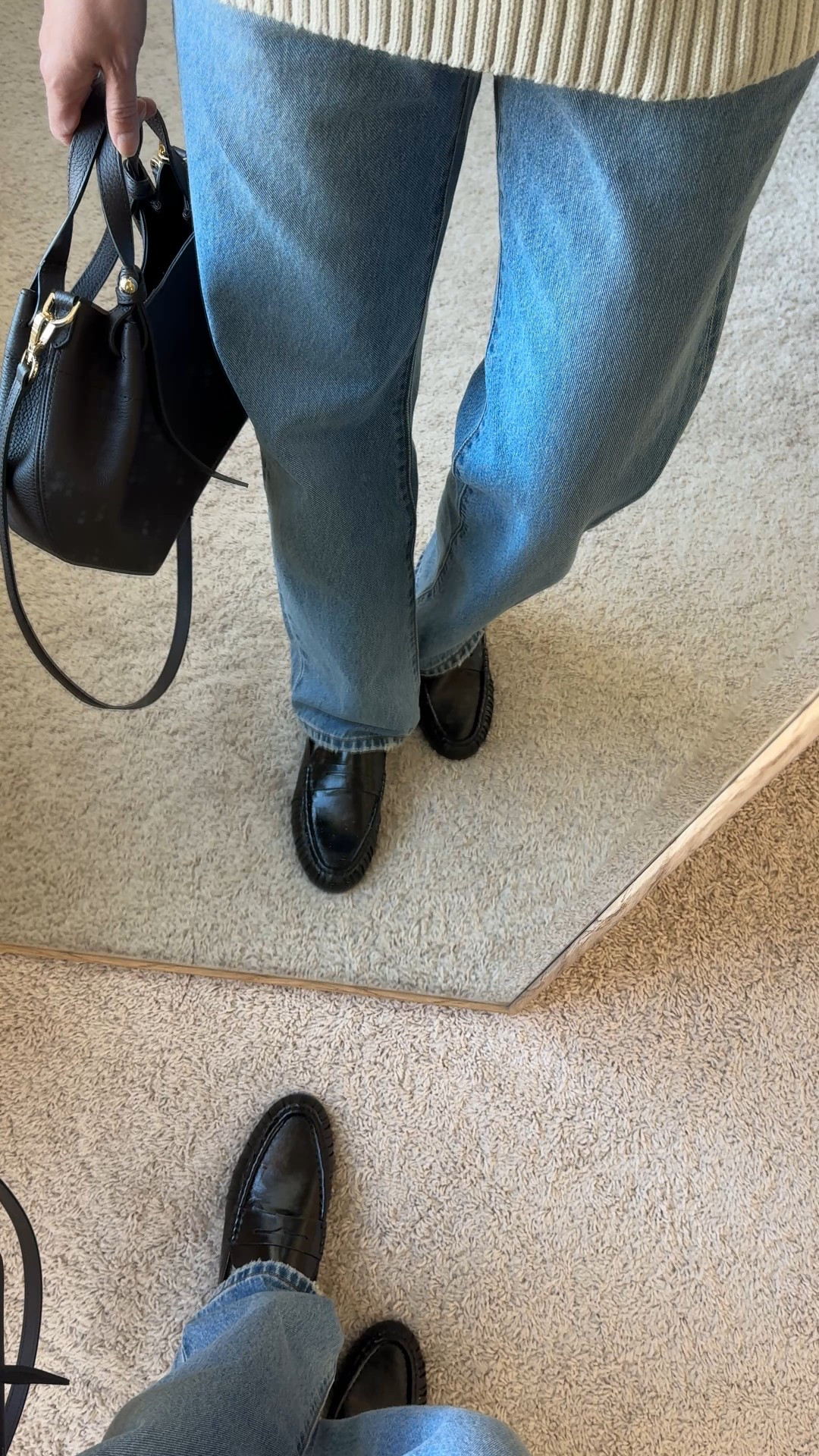 Casual chic loafer mules. Modern classic style. I’ve been wanting add a pair of loafers to my wardrobe for a while now, but couldn’t seem to find the right ones for me. Searching for more casual to wear mostly with jeans. I’m still looking to try a full loafer style, but these mules drew me in. I love ruched leather look. 
- Sizing seems true to size. I usually take a 6 in flats and that’s what I have here. If you intend to wear thicker socks, you could size up. 
- Comfy out of the box and seems to be good quality to last beyond a season. 
- These jeans are a good staple classic straight leg that also comes in ankle length. True 100% cotton denim that gets better with time. I size up in this style. 
- Classic cable knit sweater in an oversized fit. 
- Favorite staple white t-shirt as a base layer. 
- Convertible leather bag. Mid-priced luxury bag  


#LTKWorkwear #LTKOver40 #LTKootd