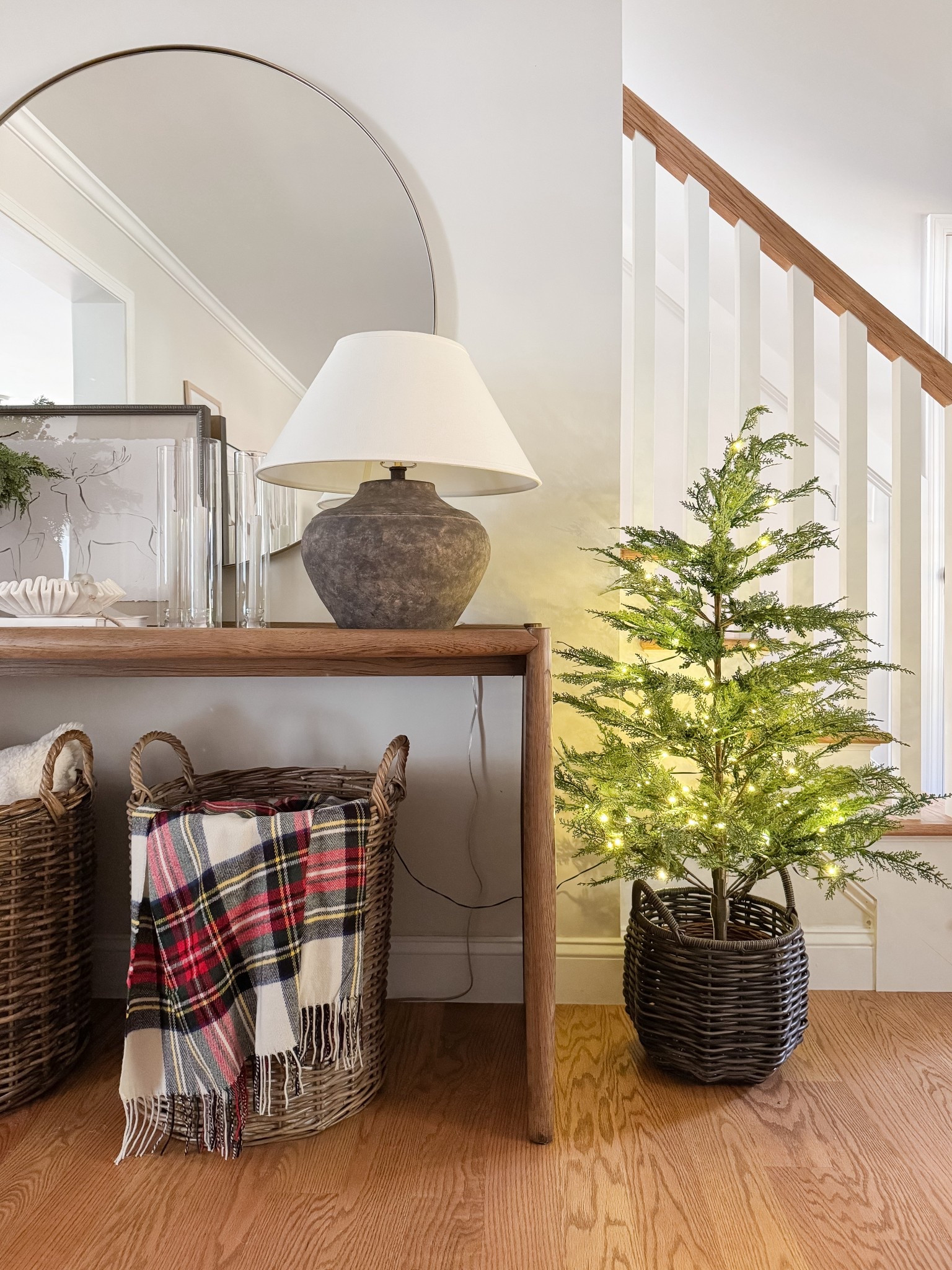Holiday Entryway

Walmart holiday tree  Wooden console table, woven basket, knit throw blanket, basil candle, book stack, marble bowl, terracotta vases, faux stems, beaded garland, Sherri calnan home

#LTKHome #LTKHoliday #LTKStyleTip