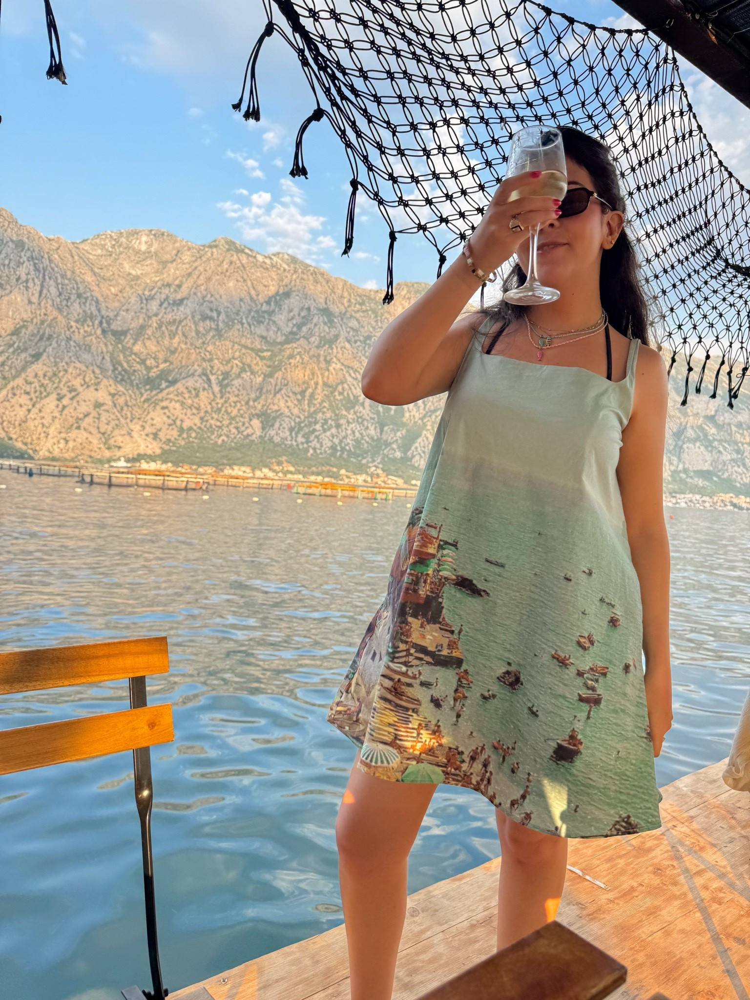 Golden hour, a waterfront view, and a dress that does all the talking. 🌊✨ This printed mini is one of those vacation pieces that instantly elevates your suitcase—easy to throw on for lunch, sunset drinks, or dinner by the water. Linking the full look (and accessories) in my LTK! 🤍 #LTKTravel #LTKStyle #VacationOutfit #ResortWear #SummerStyle #VacationWardrobe

#LTKSeasonal #LTKTravel #LTKSwim