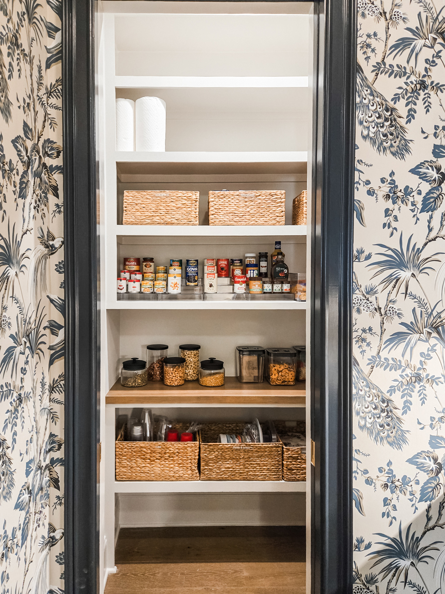 If we were this client, we might just leave that pocket door open all the time because these pantry shelves make us feel all warm and cozy inside. 🥰 

 
