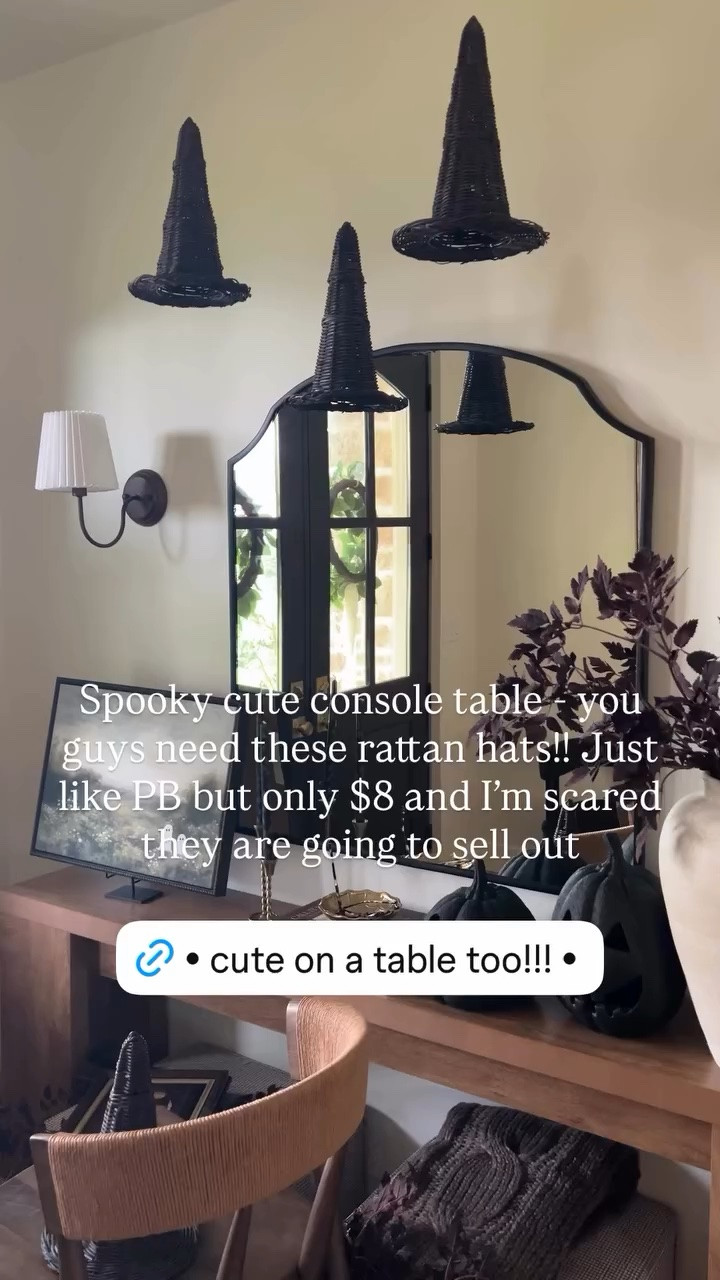 Spooky cute console table - you guys need these rattan hats!! Just like PB but only $8 and I’m scared they are going to sell out