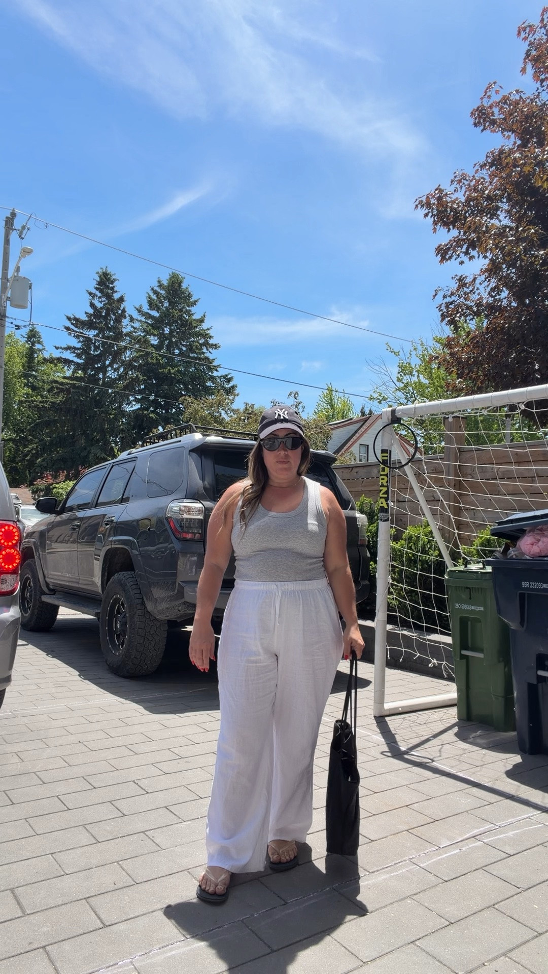 Sports mom summer uniform ☀️

@Aritzia Busy Tank + Lodge Linen Pant
size m in busy tank
size L in lodge linen
jelly thongs jeffrey campbell linked similar

Easy, breathable, comfortable, and makes me feel put together in 30 seconds. Both are Aritzia Clientele sale recommendations from me this season and more reco’s coming soon!✨

#LTKcanada #LTKpetite #LTKsale