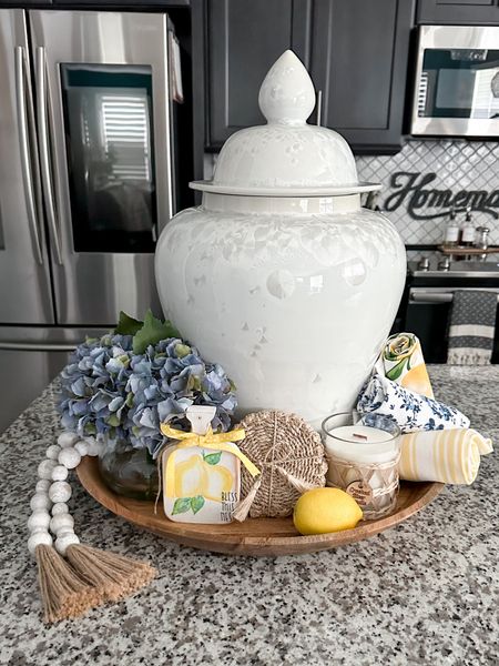 Summer yellow and blue lips with sunflowers lemons and hydrangeas•Love to style this ginger jar whether it’s filled with flowers or have fun seasonal decor around it. #summerkitchen #summerdecor #yellowdecor #lemondecor #hydrangeas #styledtray #bohemiandecor #kitchendesign #kitchentowels #lemontowels #kitchenisland 

#LTKSeasonal #LTKStyleTip #LTKHome