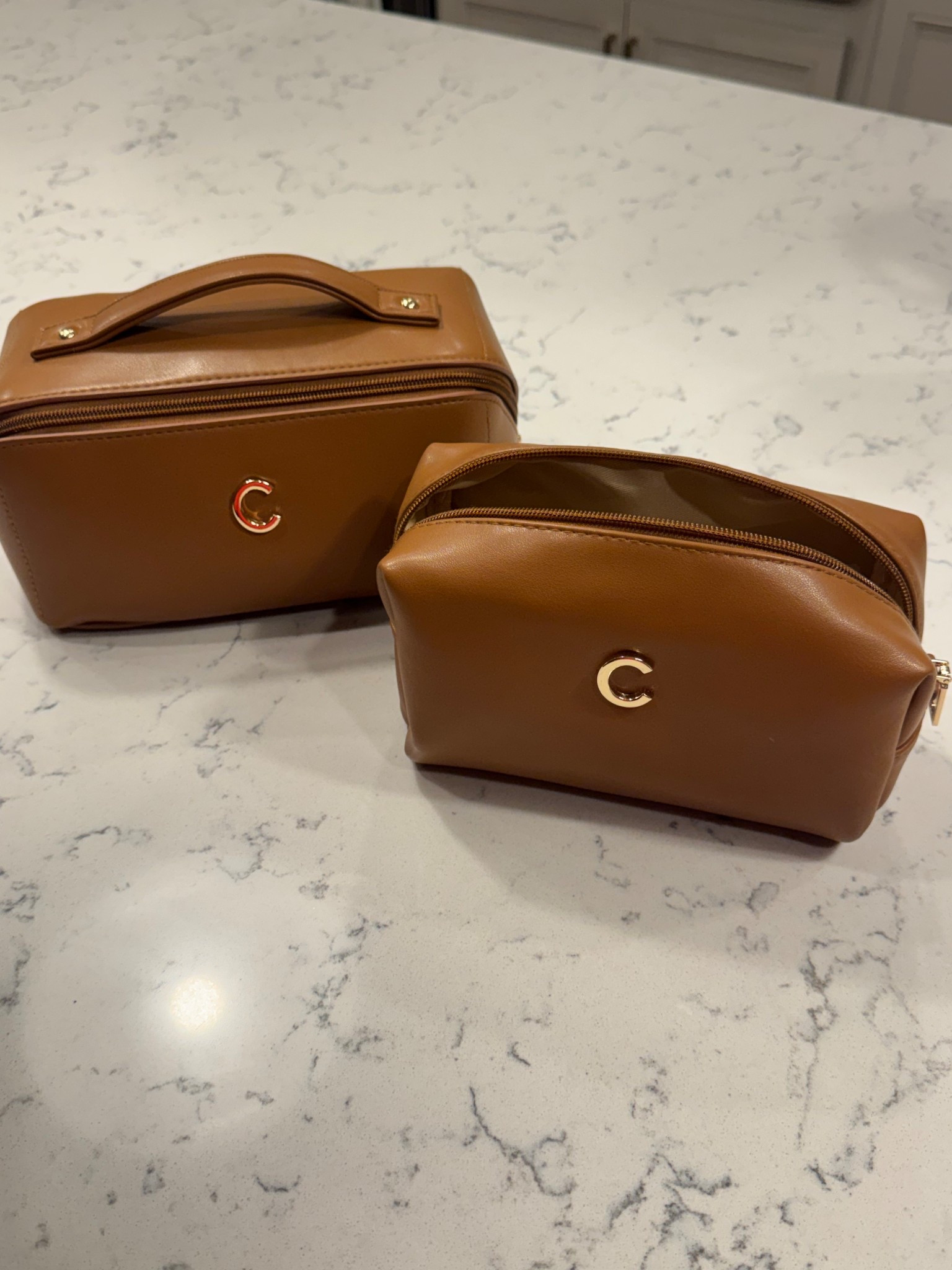 Set of 2 travel cosmetic bags with Initial. Available in 4 other colors 

#LTKBeauty #LTKTravel #LTKgrwm