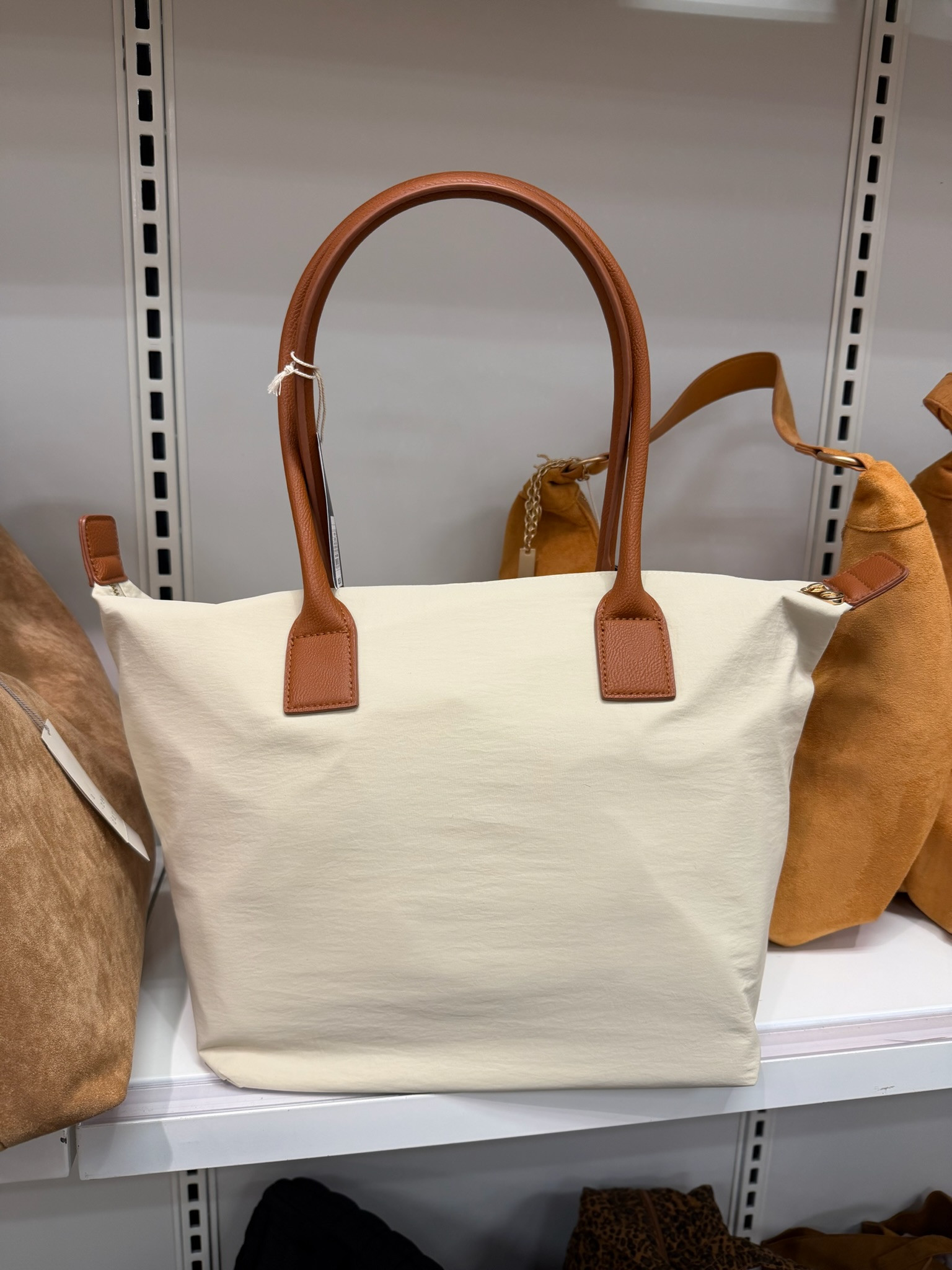 I am completely obsessed with this foundational tote handbag from Universal Thread! It looks like a certain designer inspired bag i love, but at a fraction of the cost. The quality is amazing and it is the perfect size for carrying all of your daily essentials while still looking so chic and polished. It is such a great elevated basic that goes with everything in your closet. 

accolade crew neck pullover, chocolate brown outfit, date night outfits, dark wash denim, silver hardware, analog hobbies, valentines outfit women, knits and shawls, valentines day outfit women, vacation outfits beach, universal thread, tote bag, designer inspired, aesthetic style, everyday bag, target finds, chic accessories, neutral aesthetic, closet staples, affordable luxury 

 #LTKValentine #LTKgrwm #LTKootd