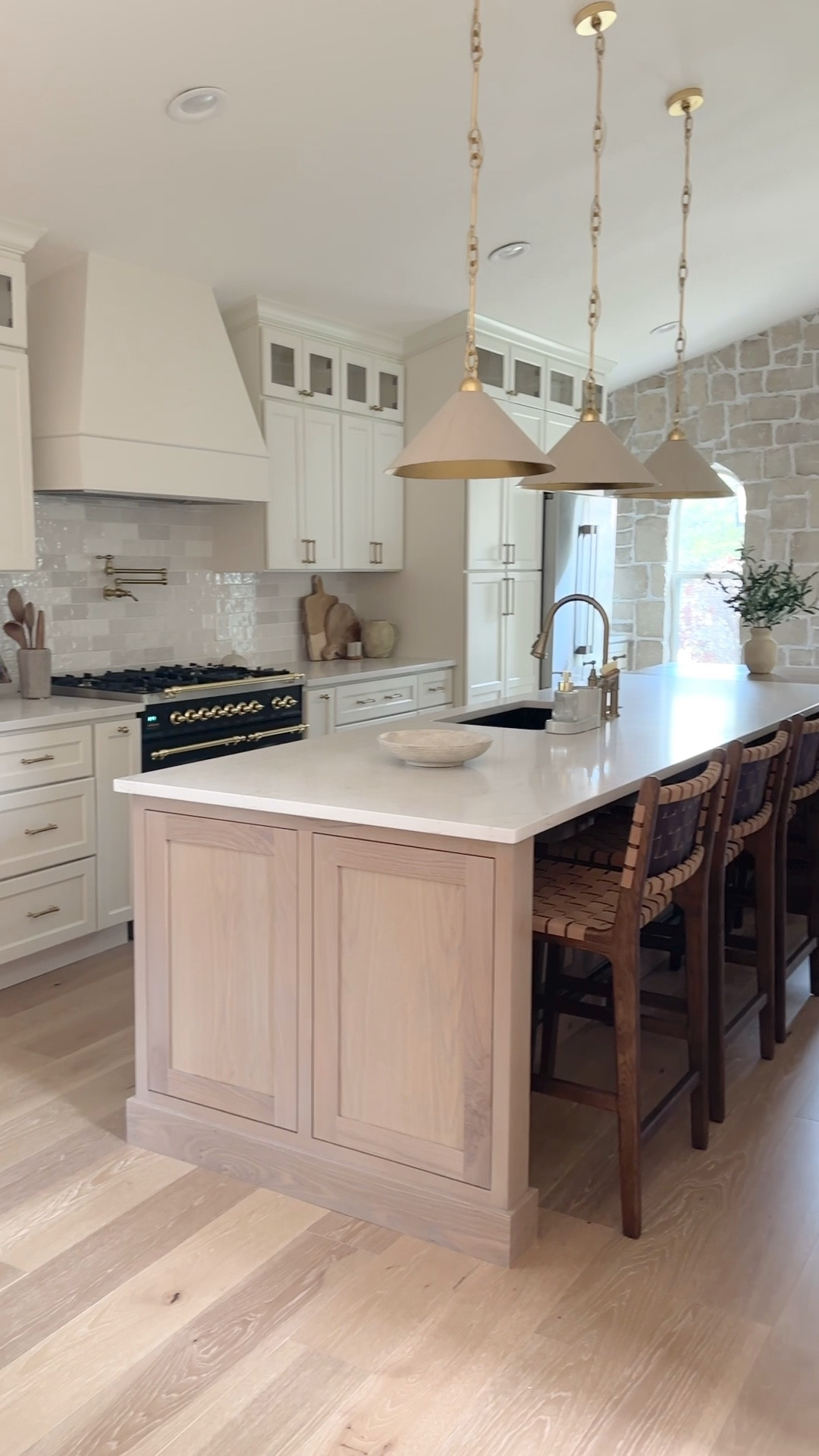 This light and bright neutral kitchen turned out like a dream. The woven barstools look so beautiful in this space with the luxury pendant lights hanging above. Kitchen goals. 

#interiordesign #kitchen #kitchenisland #homedecor 

#LTKStyleTip #LTKHome #LTKFamily
