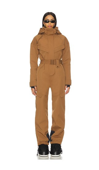 CORDOVA Apex Ski Suit in Brown. - size S | Revolve Clothing (Global)