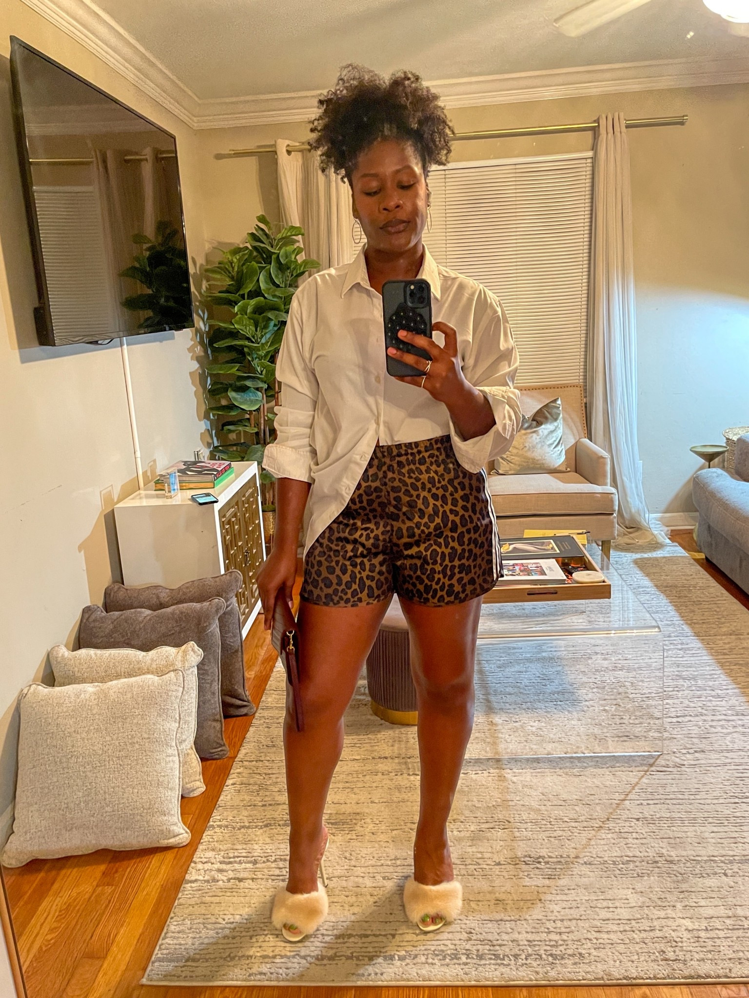 Sporty meets girly ootd with leopard track shorts, mink mules, and a men’s button-up!

#LTKootd #LTKMidsize