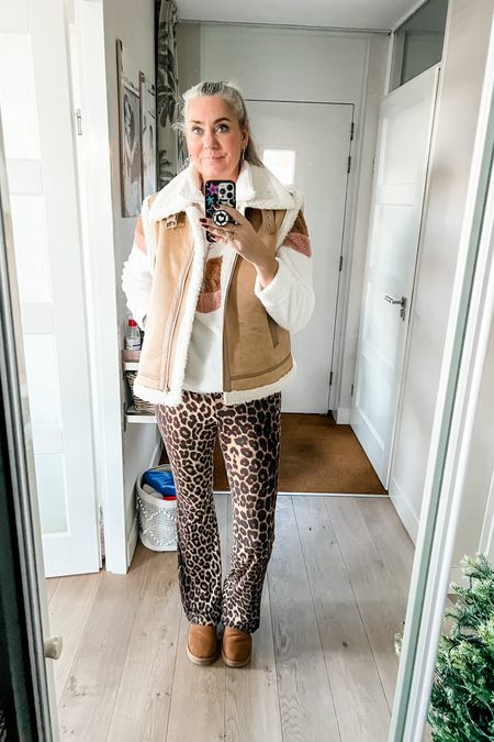 Ootd - Tuesday. Layering up for the home office in a Uniqlo heattech shirt (these are the best!), an old fleece sweater, an oversized teddy gilet paired with leopard print flared leggings an classic Ugg boots. 



#LTKstyletip #LTKeurope #LTKmidsize