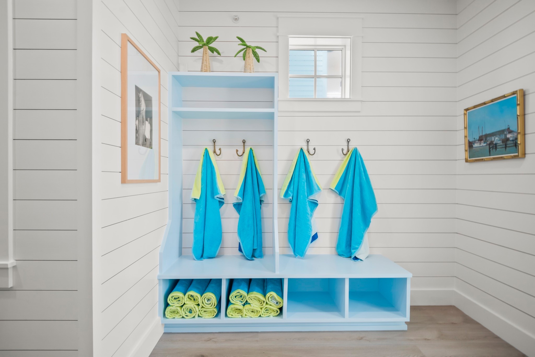 Hooked on coastal charm 🎣
From the fish hook towels to the art by Urban Garden Prints, this entryway is full of seaside personality. Anchored by the Coastal Living Home console table by Universal Furniture (find it on Wayfair!), it’s where function meets ocean-inspired style. 🌊🐟