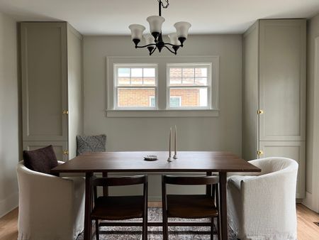 Transitional dining room with dark wood dining table, dark wood rounded back dining chairs, and upholstered dining chairs.

#LTKFind #LTKhome