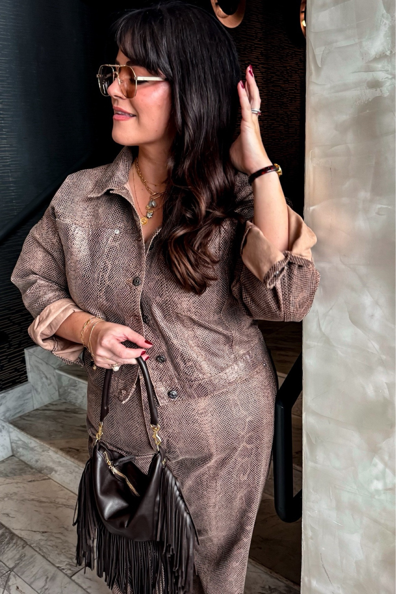 Midsize denim on denim snake matching set wearing a US size 14 regular in the jeans and a size large in the jacket Heels are tts Fri

#LTKMidsize #LTKStyleTip #LTKSeasonal