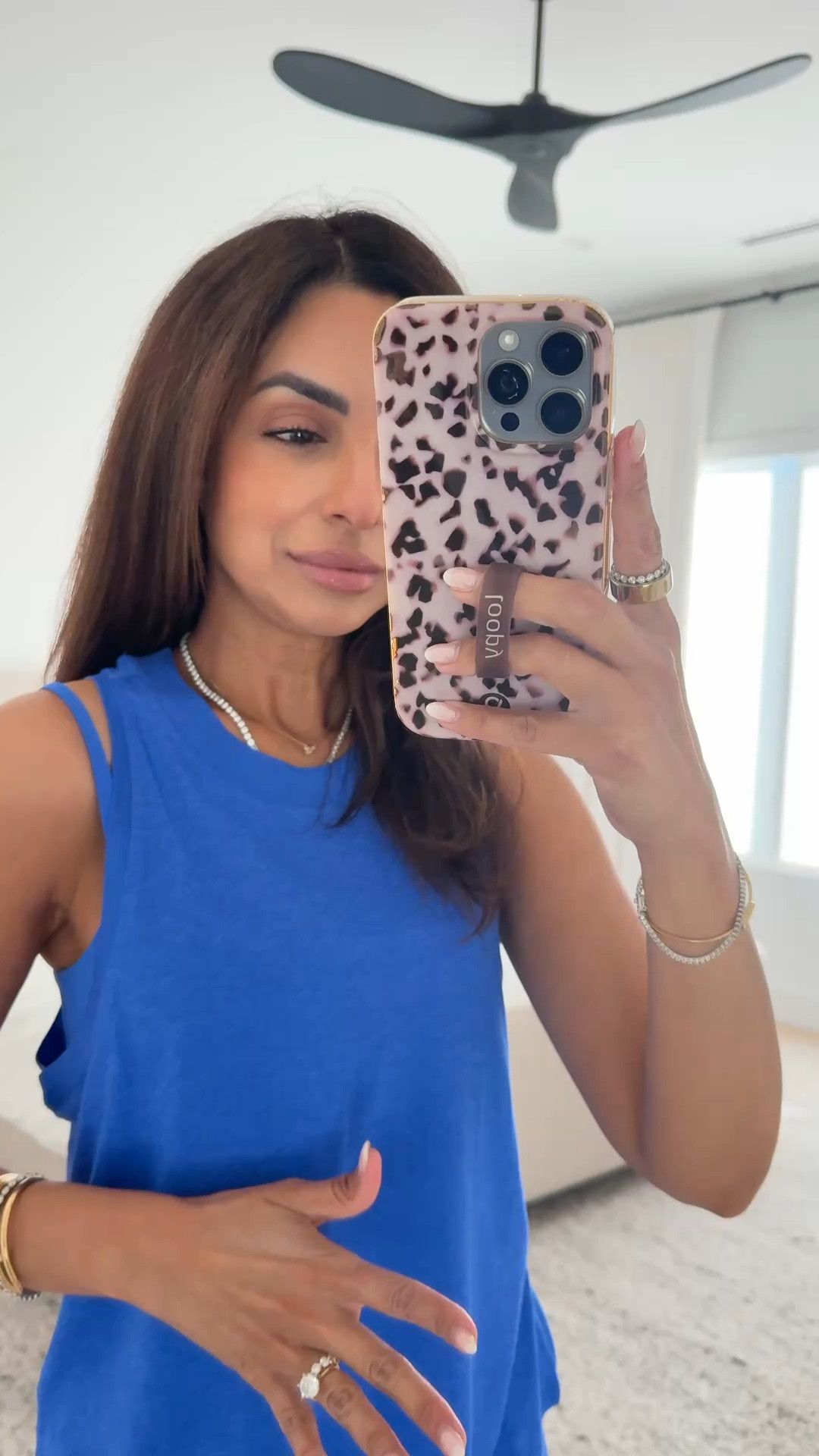 A pop of blue 💙 Sharing some of my favorite @Vuori US  pieces in the prettiest new color. Comfy, flattering + some of my absolute favorites for activewear! I wear an xs in these tanks & xs short length in my leggings #vuoripartner

#LTKActive #LTKOver40 #LTKootd