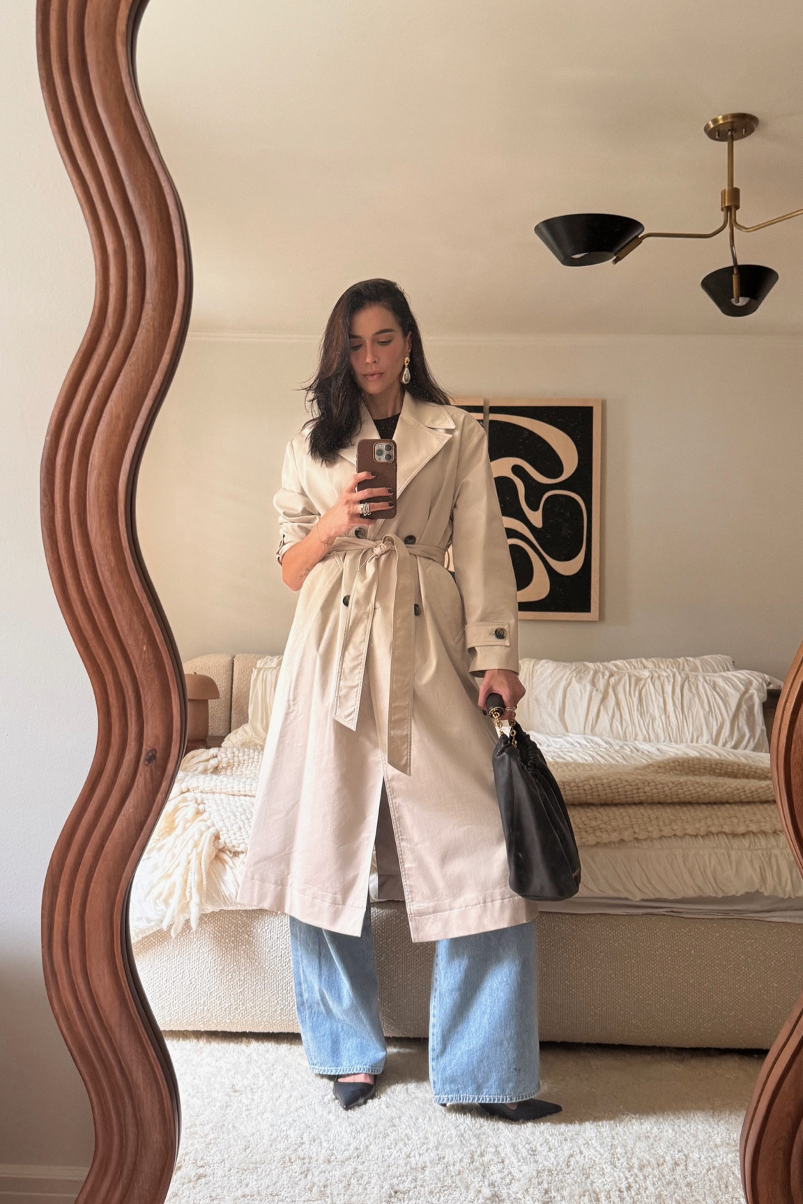 This trench is lightweight and water repellent, perfect transitional style piece. I like it fully cinched like this with heels and baggy jeans popping out below. I’m 5’10 wearing a size Medium in the trench, size 27 in the jeans and sized down a full size on my heels

#LTKStyleTip #LTKSeasonal