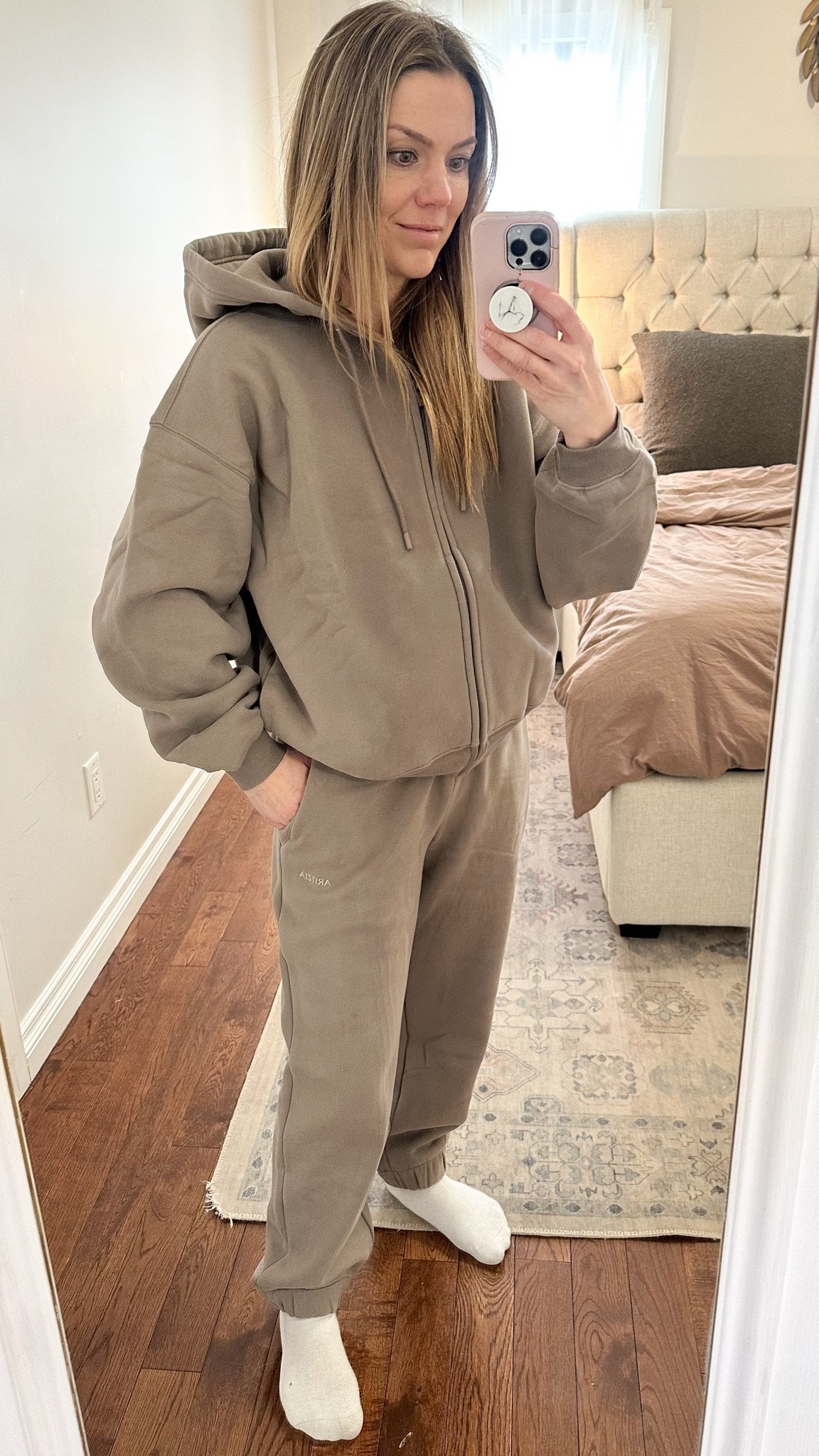 Wearing a small in both 