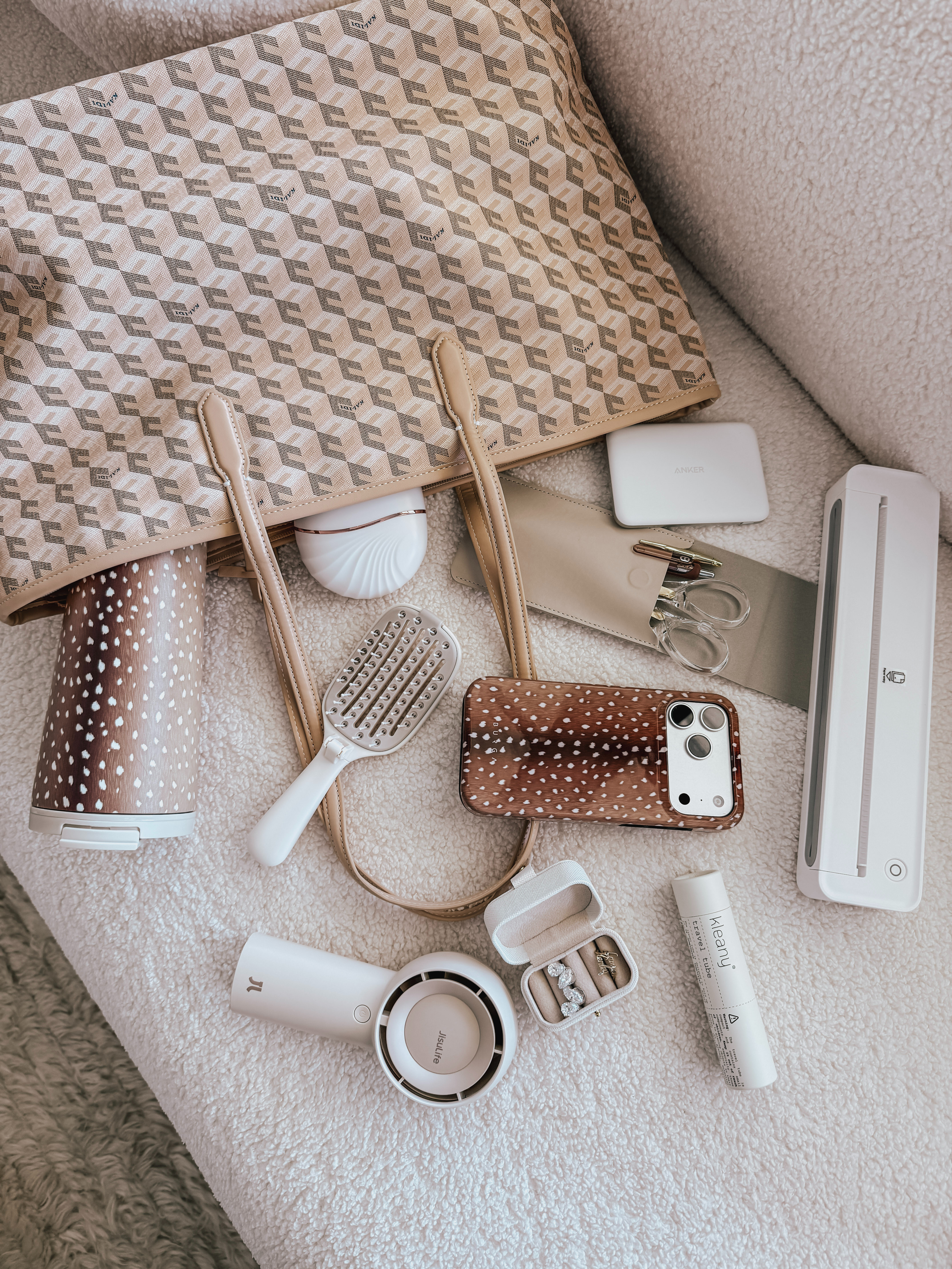 The ultimate fall work tote 🍂🤎 This neutral fawn-print bag is giving effortless fall style while holding all the things. It’s roomy, practical, and perfect for work, errands, travel, or busy days on the go. A total everyday bag you’ll want to carry everywhere! 

 #LTKdayinmylife #LTKgrwm #LTKvlog