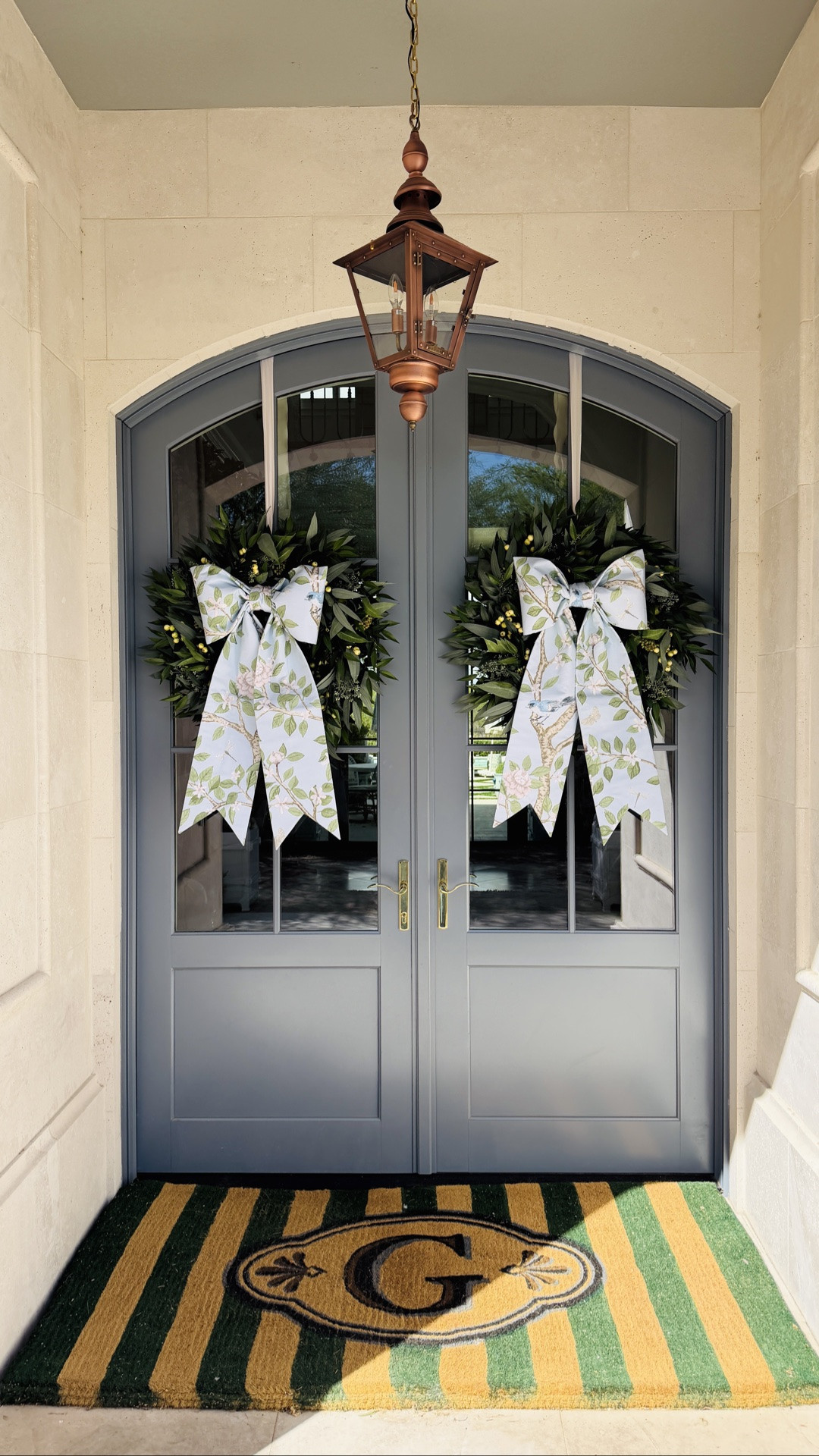 Want to elevate your front PORCH in an easy, high-impact way? Start with your door.

Layer my favorite eucalyptus wreath for a base you can use year round, then add this stunning chinoiserie bow for a polished, elevated look. 
A monogrammed doormat and some pretty planters complete the look. 🤍

#LTKHome #LTKSeasonal