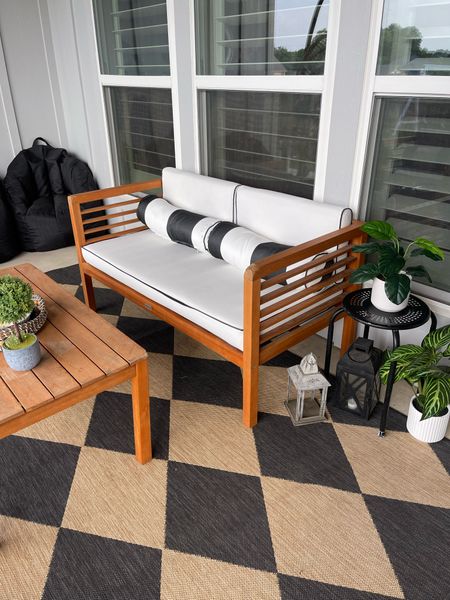 Our outdoor furniture on our back porch! This furniture has lasted us almost 2 years now and it’s still looking great. The cushions are easy to clean if you power wash them & they are removable too. Also, these beanbags are great for extra seating!
•
•
•


Patio furniture, outdoor, set up, wooden black and white furniture for porch, outdoor entertaining 

#LTKhome #LTKSeasonal