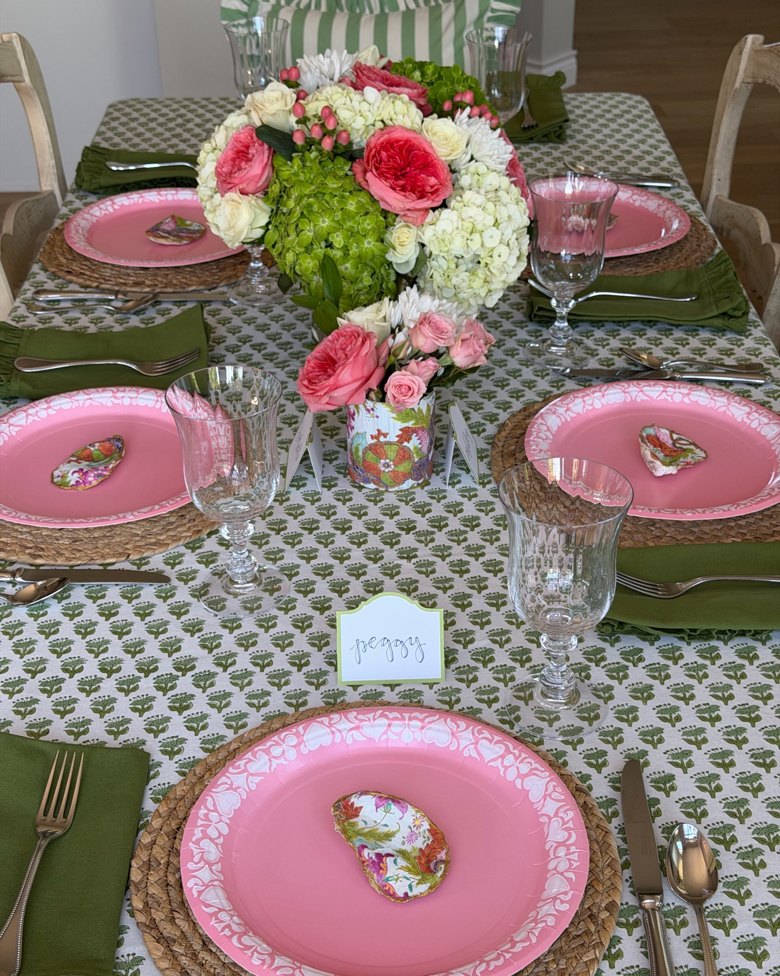 The sweetest pink and green table with the sweetest friends. I had some girls from Bible Study for lunch today and it was so good to just sit, enjoy each other‘s company and catch up!  

I loved putting together the pretty pink and green arrangement, which looks perfect with the green block
print tablecloth, fun ruffle napkins, and pretty paper plates from @Pavilion Paper. 🩷💚
