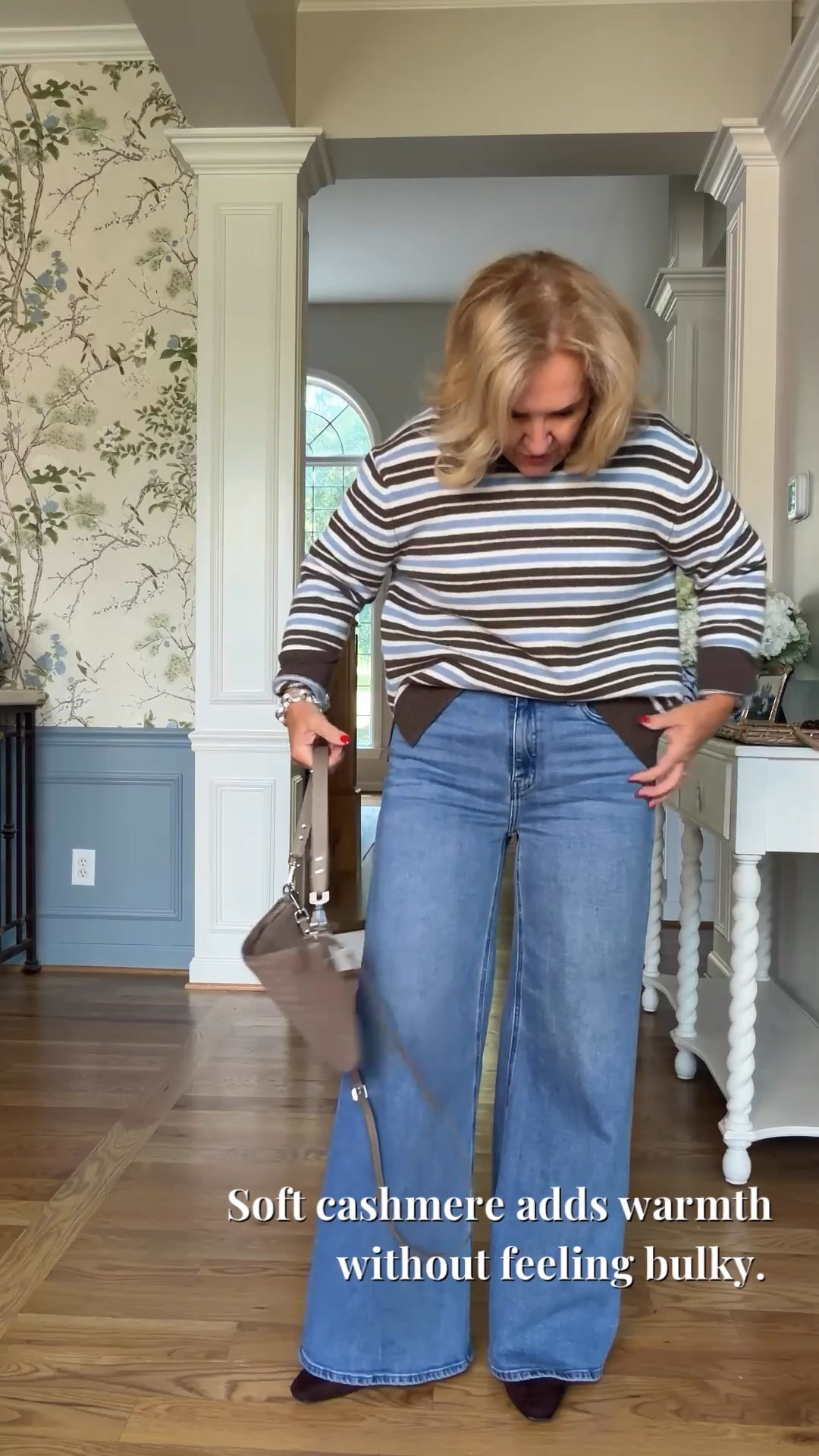 There’s something about a striped sweater with wide-leg jeans that just works for me. I’m wearing a medium in the sweater and a size 29 in the jeans, and the brown bag and shoes pull all those colors together nicely.

#LTKootd #LTKgrwm #LTKOver40