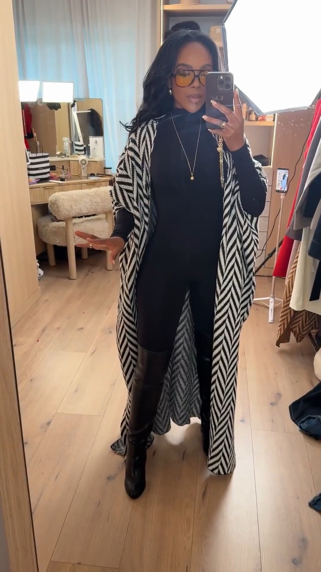 Scroll to shop 🖤  

A chic monochrome outfit featuring a fitted black base layer with a statement knit wrap and tall boots — an easy elevated look for cooler days.

Measurements: 5'4" | 138 lbs | 34D | 27" waist | 40" hips  
Sizing: Bodysuit Small | Wrap Small | Boots True to size

#LTKootd #LTKTravel