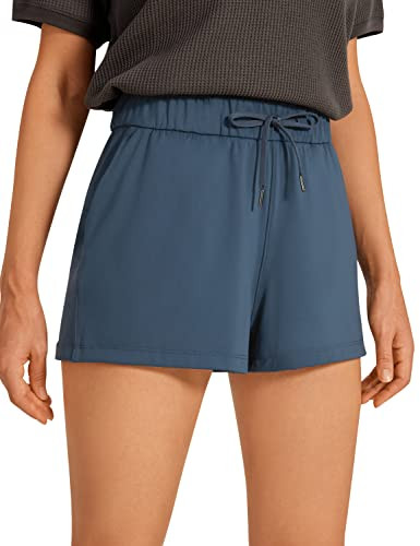 CRZ YOGA Pantalones cortos elásticos para mujer, estilo casual, de 2.5 pulgadas, con bolsillos p... | Amazon (US)