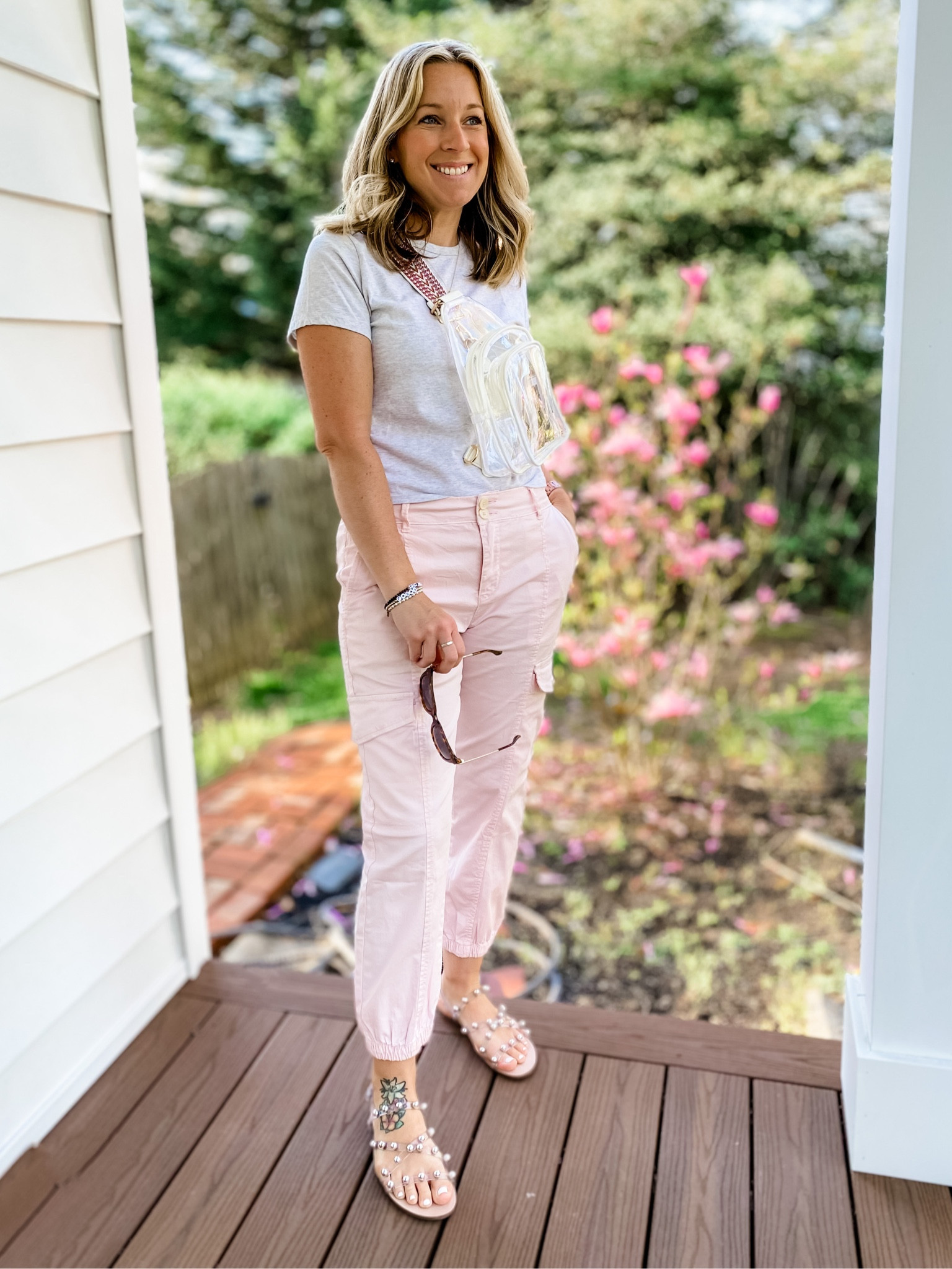 Got my new Riley clear sling bag on and I’m ready to rock! Cargos, baby tee, neutral sandals. Perfect for work or a concert in this beautiful weather! Spring time is finally here!! 

#LTKitbag #LTKSeasonal #LTKstyletip