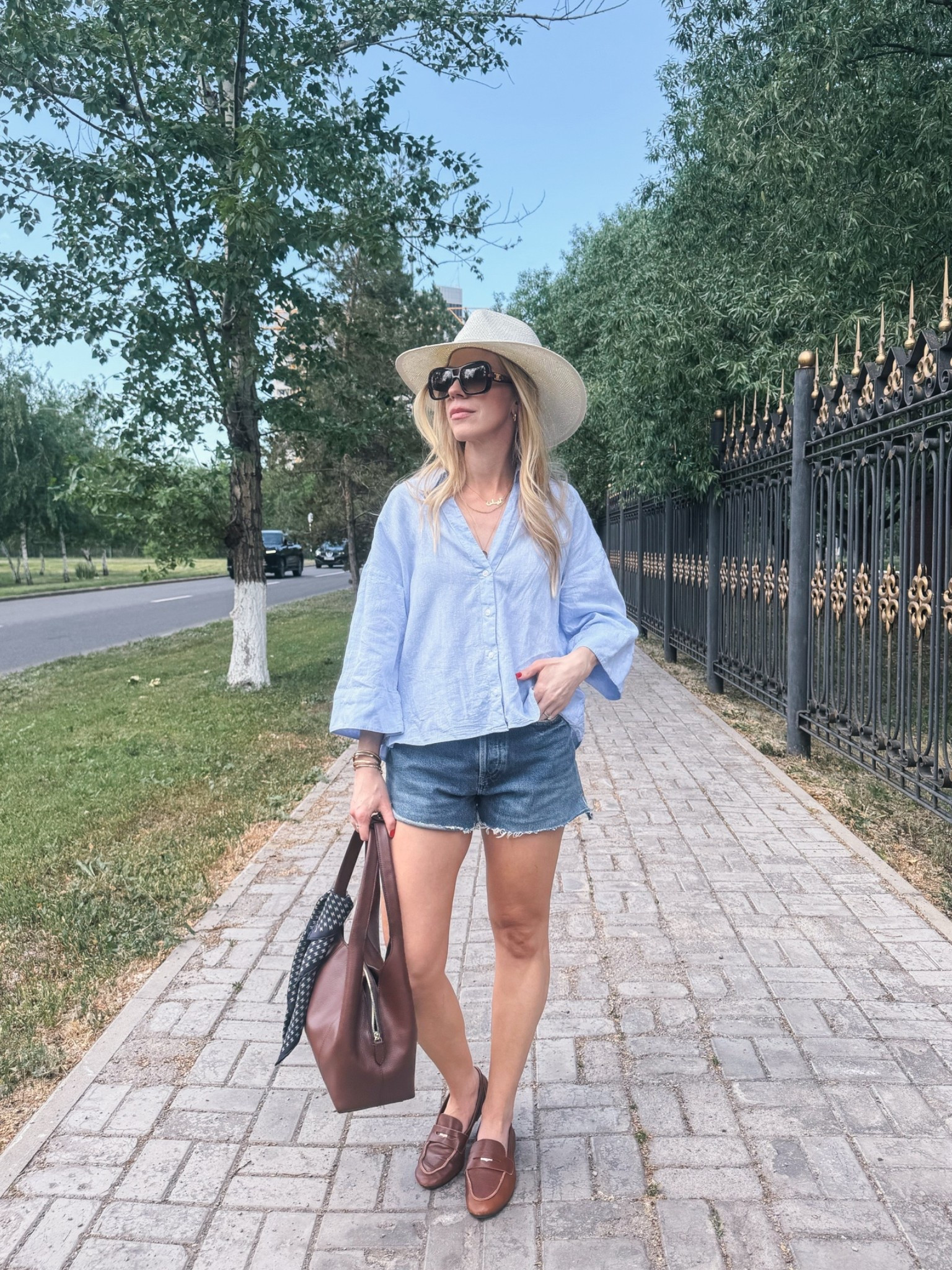 Casual summer outfit, blue linen shirt, denim cutoff shorts, @Janessa Leone straw hat, @Zara leather loafers, Le Tanneur handbag (ON SALE NOW!)

#LTKTravel #LTKOver40 #LTKSaleAlert
