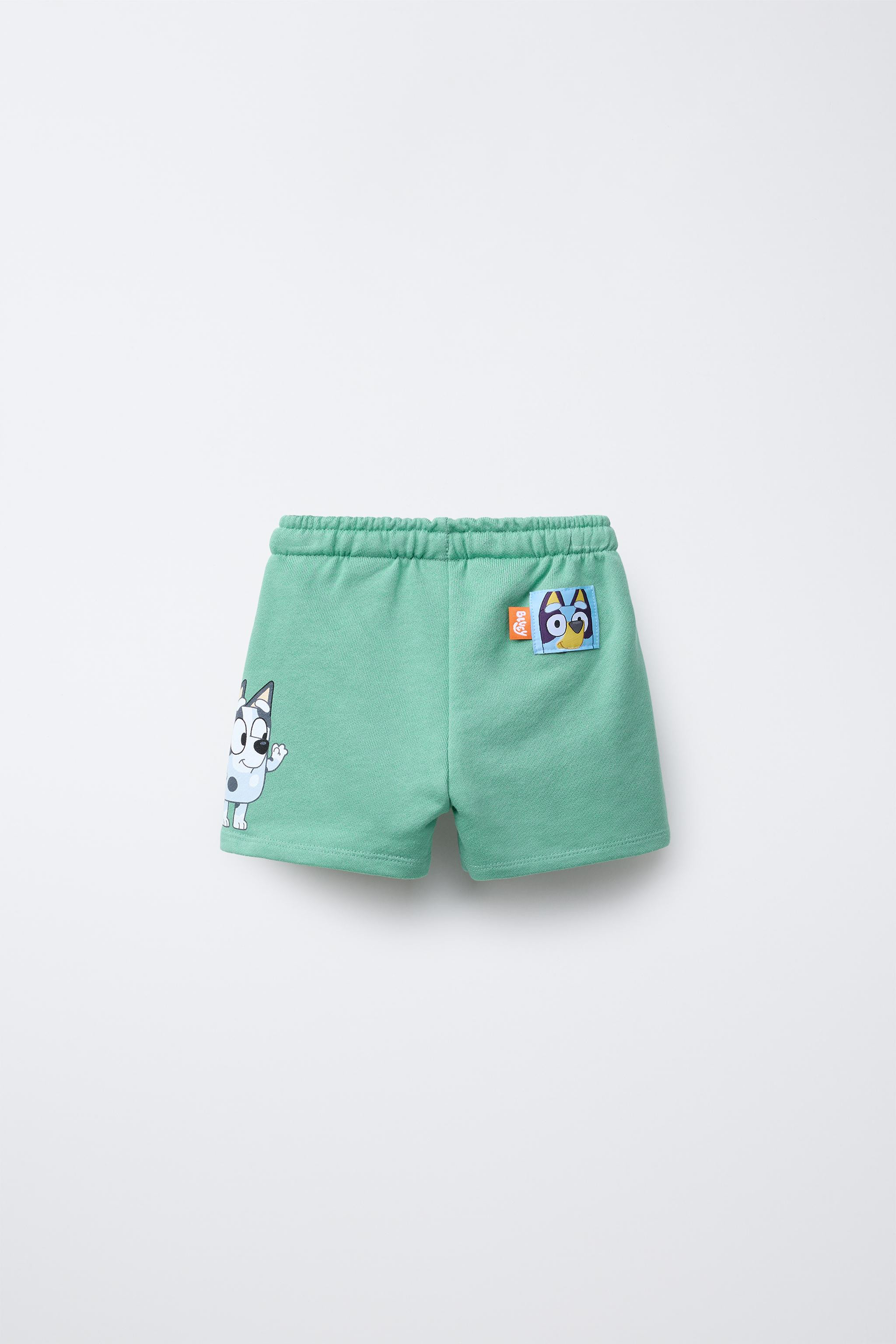 Plush shorts with elastic waistband and adjustable front drawstring. BLUEY © LUDO STUDIO print o... | Zara US