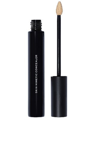 MAKE Beauty Skin Mimetic Concealer in 05 Medium Warm. | Revolve Clothing (Global)
