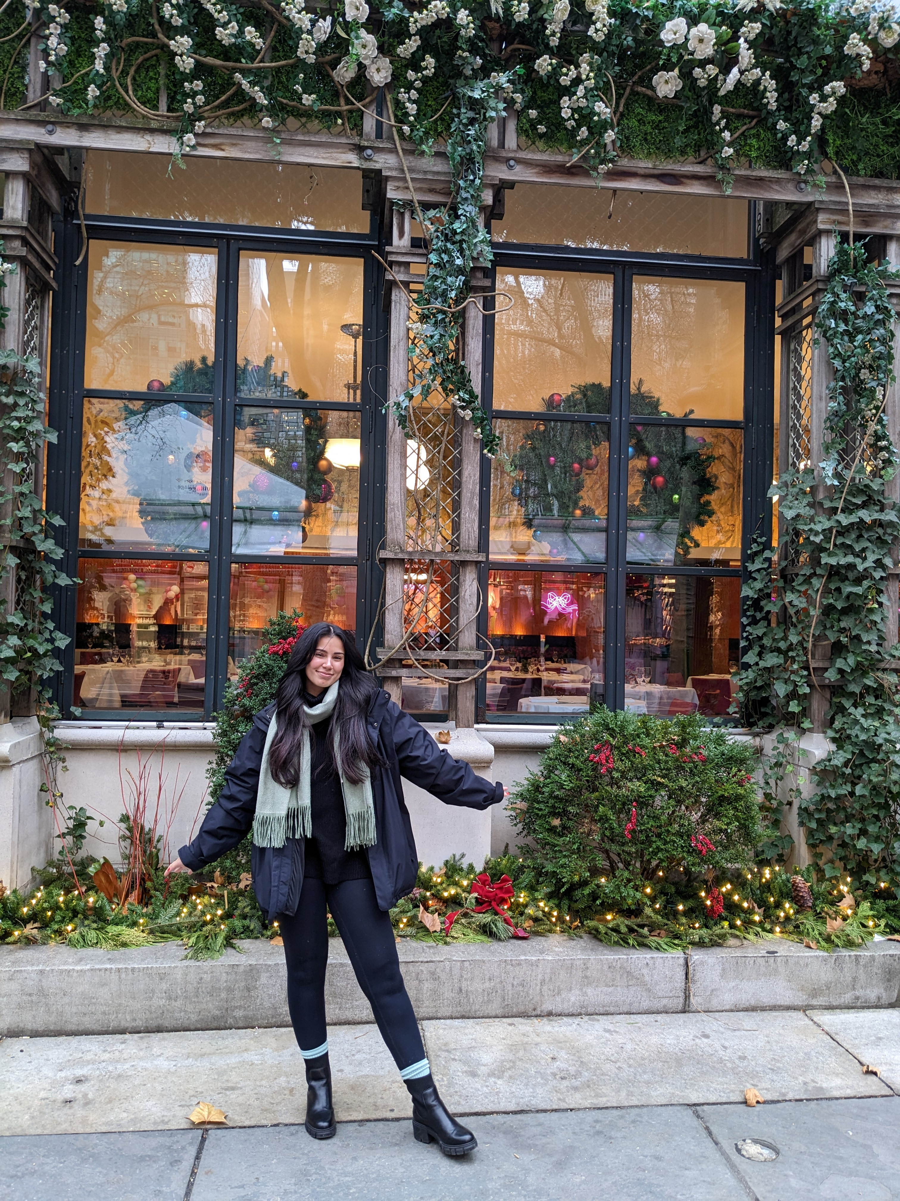 The warmest fit for walking around NYC! All black outfit composed of a sweater, leggings, coat, and boots. Topped off with cute green socks and a matching green scarf! 

#LTKHoliday #LTKSeasonal #LTKTravel
