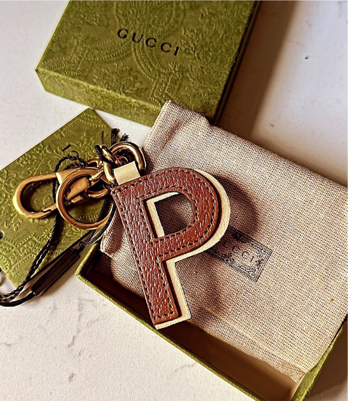 I’m an aesthetic person from A to Z I love personalized items, big or small, initials, zodiac signs etc and this Gucci initial keychain adds the razzle dazzle I was looking for. 
Find your initial today. 

#LTKFind #LTKSeasonal #LTKhome