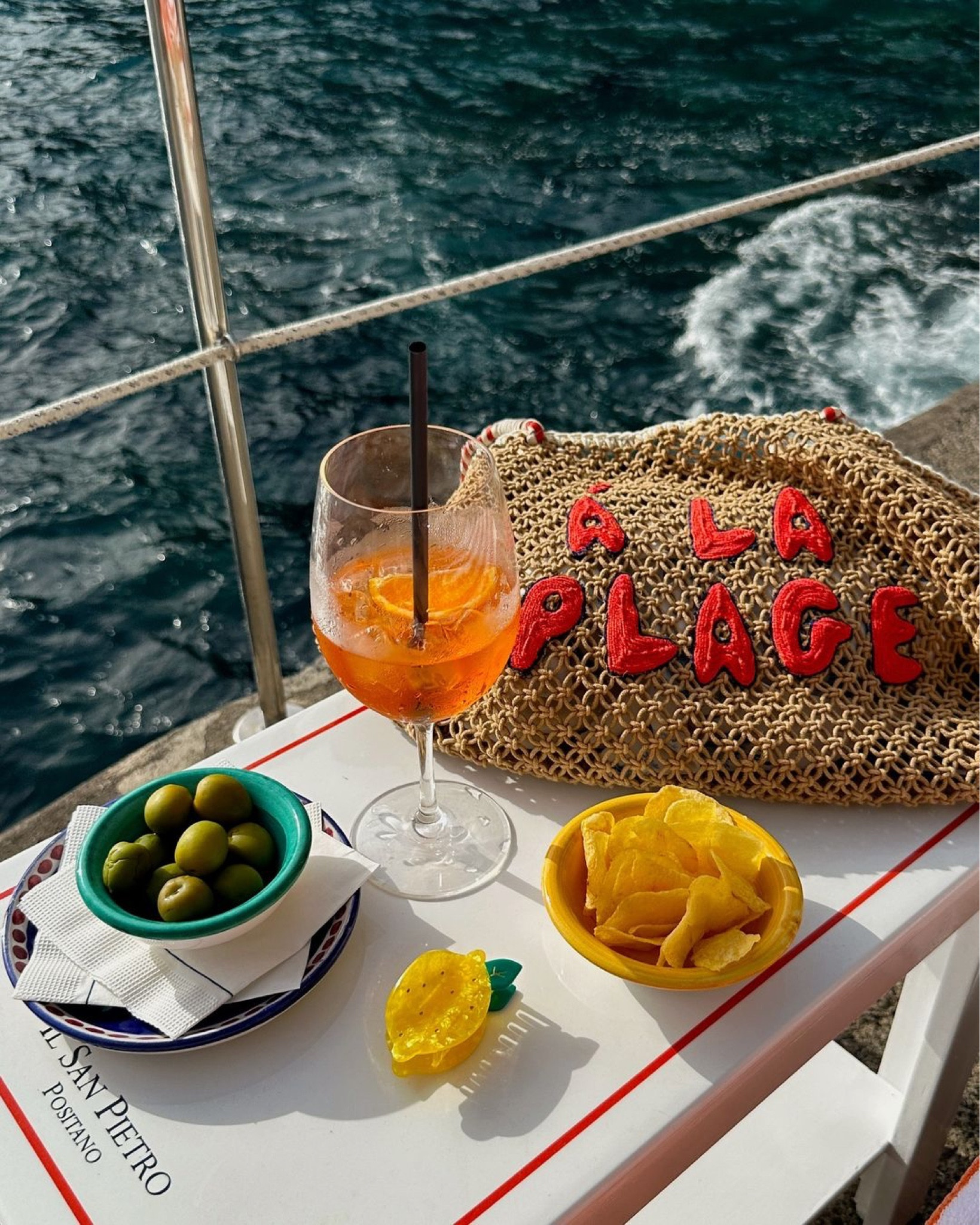 Beach day accessories I wore in Italy 🍋 woven beach tote bag, lemon hair clip

#LTKStyleTip #LTKSwim #LTKSummerSales