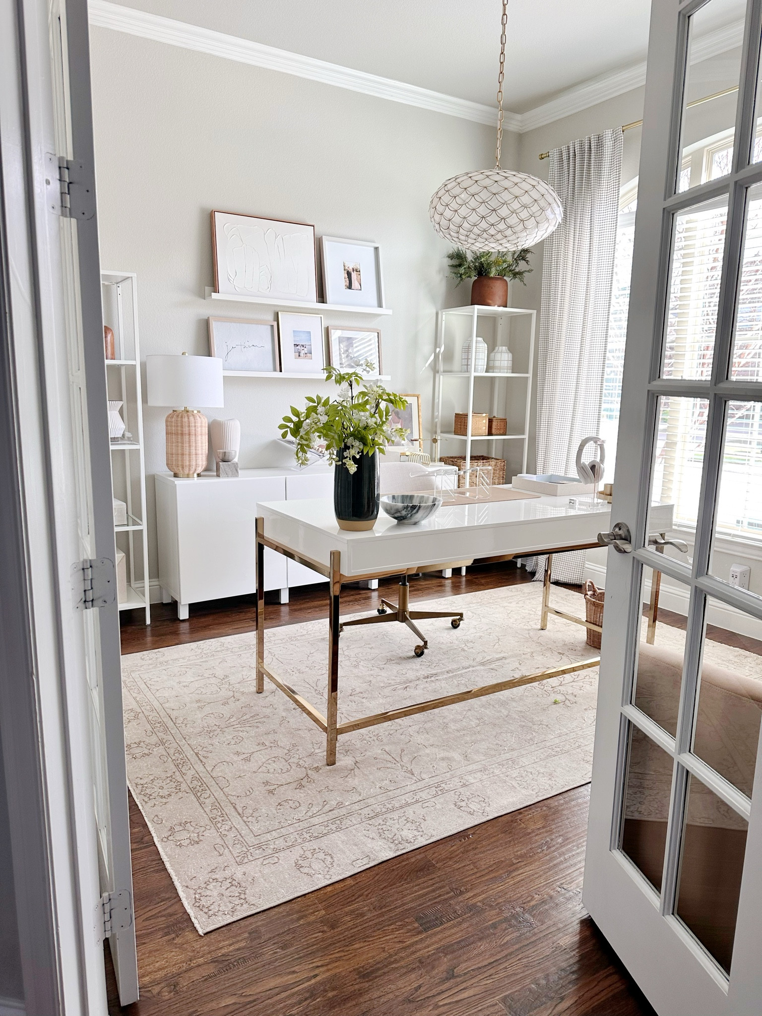 Home office views ✨ I definitely believe the right space can trigger creativity! I definitely mixed styles and finishes in my office, from the vintage rug to the capiz chandelier. 

#LTKhome