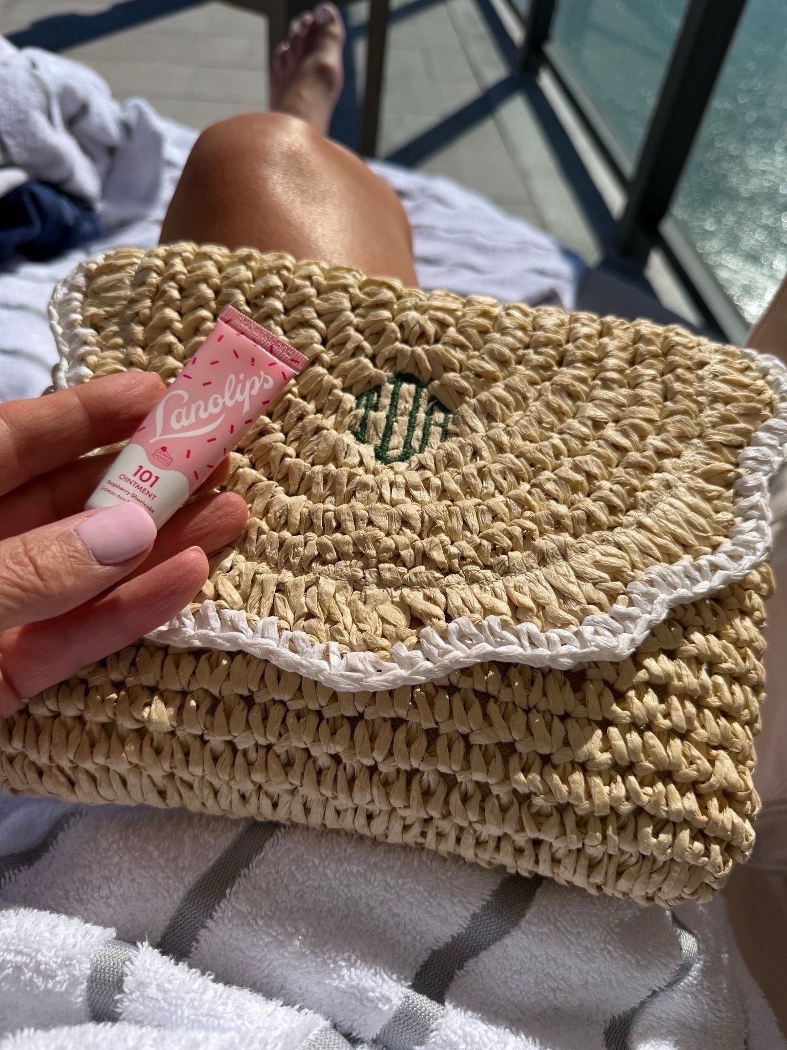 Loving this scalloped raffia clutch lately. It’s the perfect size for dinners and easy to grab when I’m out and about. And I haven’t stopped using the Lanolips 101 ointment, it’s always in my bag.

#LTKdayinmylife #LTKSeasonal #LTKOver40