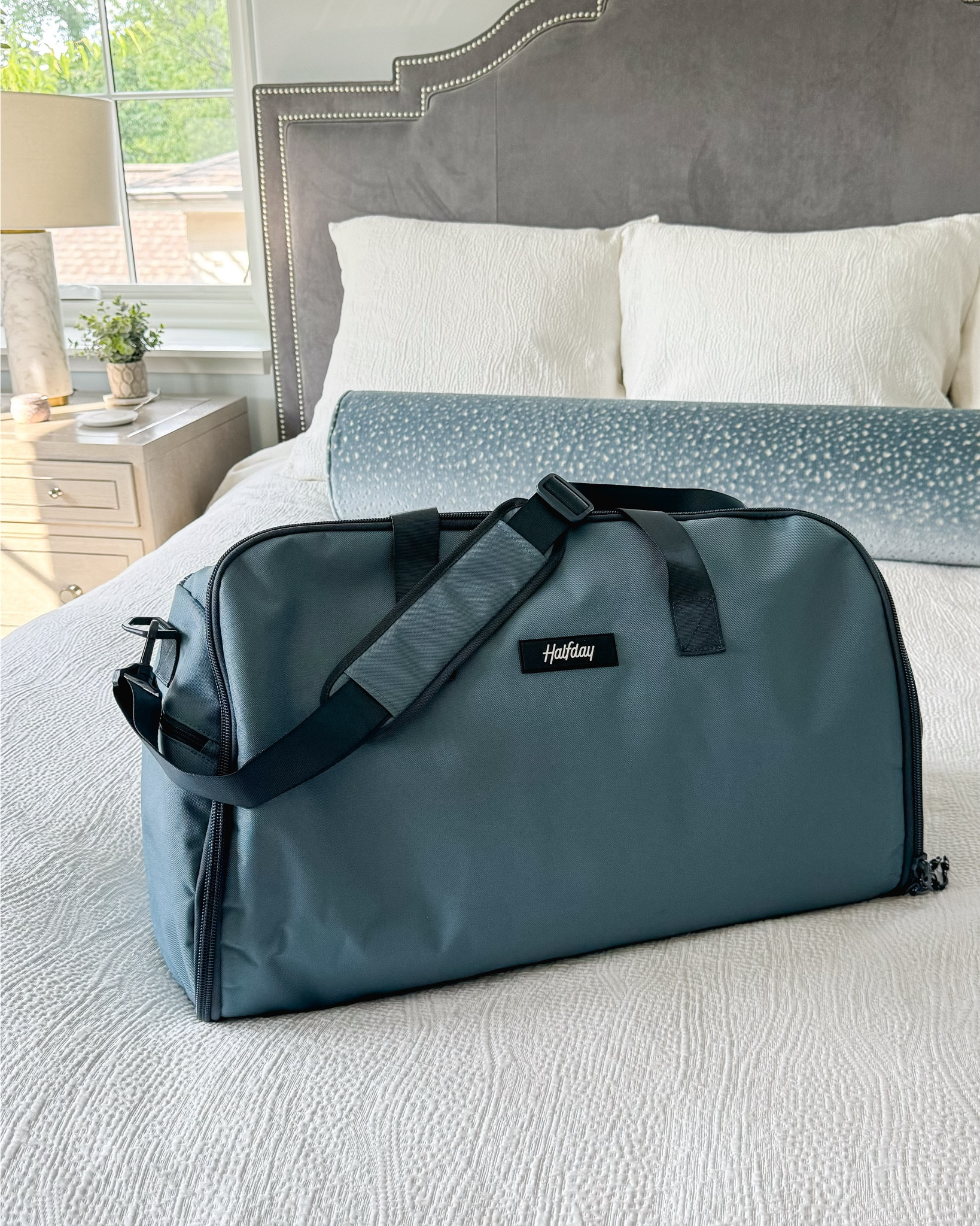 Meet my new travel partner, the Garment Duffel from @halfdaytravel! 🧳 This bag has so many great features whether you’re going on a quick work trip or fun weekend getaway. 

•Hang garments to keep them wrinkle-free
•Separate shoe compartments
•Stores 3-5 days worth of clothes
•Made of water-resistant material
•Comes in 10 colors and under $100
•Trolley sleeve to attach to rolling luggage 
•Stores flat

 #halfdaytravel #halfdaytravelpartner #takeahalfday #ad #travelessentials 

#LTKTravel