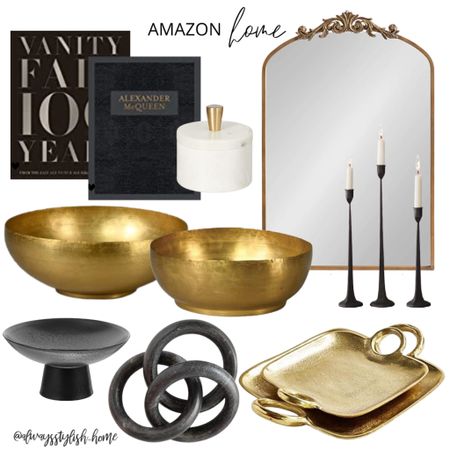Amazon moody home decor, gold antique mirror, anthro dupe mirror, marble bowl, coffee table book, vanity fair book, Alexander McQueen book, black taper candlestick holder, black marble link, black pedestal bowl, gold bowl, brass tray set

#LTKhome #LTKFind