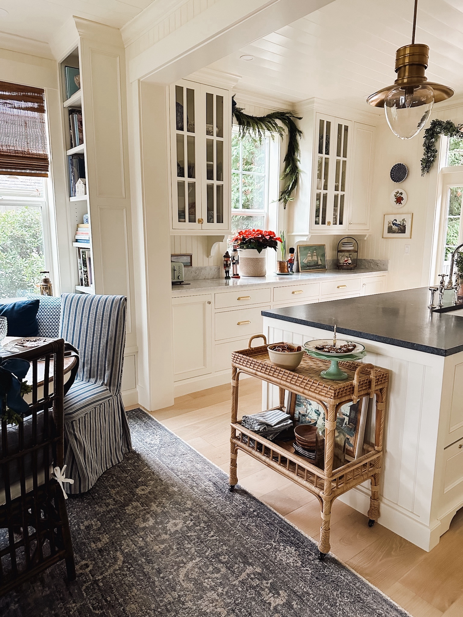 Kitchen rattan cart, blue and white stripe dining chair, bamboo shades, blue patterned area rug 

#LTKHoliday #LTKhome #LTKSeasonal